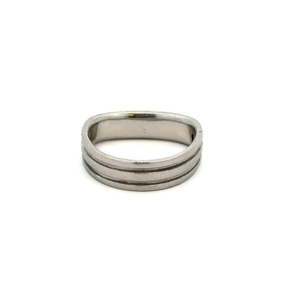 Handsome Gent’s Coffin & Trout Designer Ribbed Platinum Band Ring. Hand crafted Platinum mounting. Approx. 0.90” w. Ring size 9.74, we offer ring resizing.  In excellent vintage condition. For a Special Someone…Including You!
