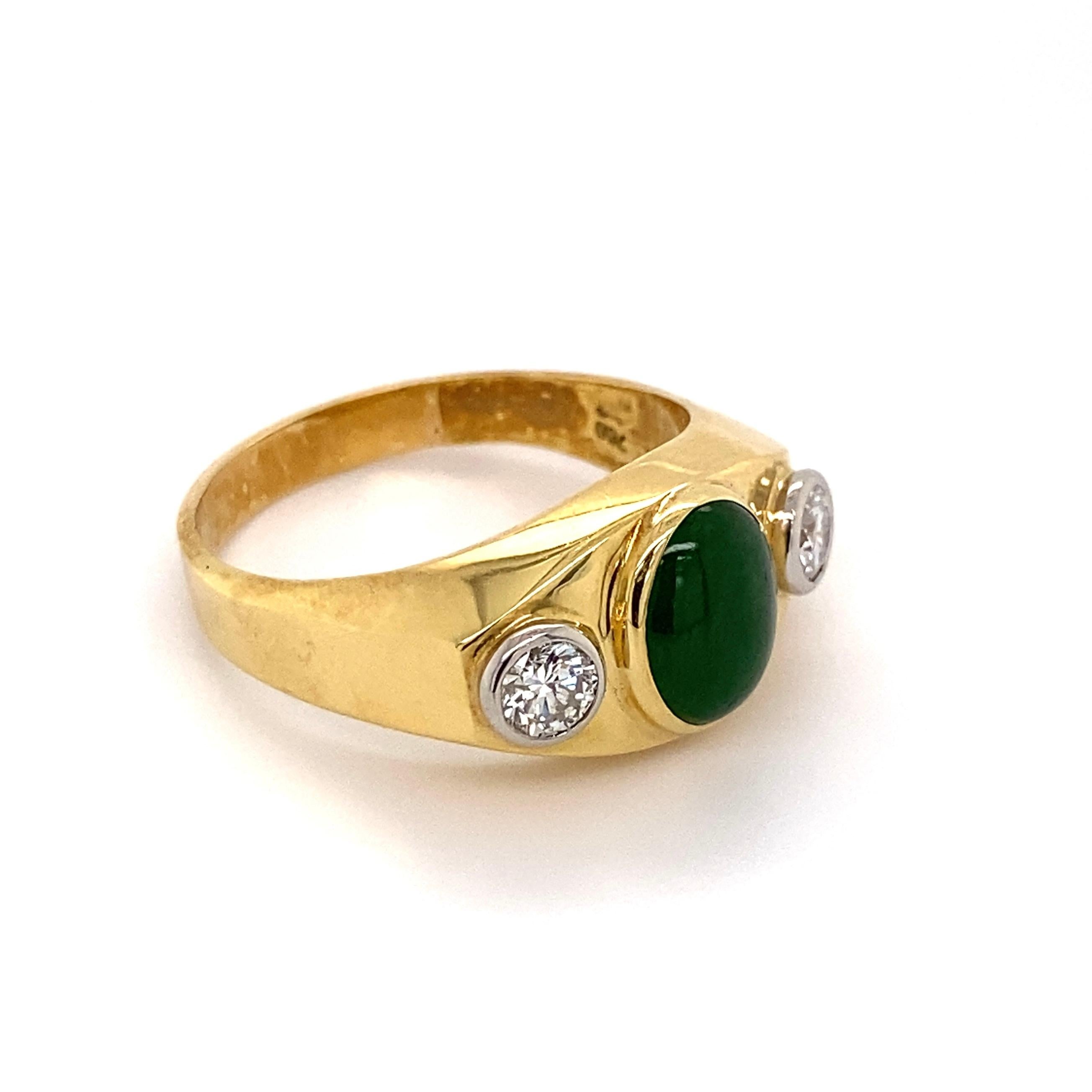 Handsome Gent’s Three-Stone Jade and Diamond Gold Signet Ring, centering a securely Hand set 1 Carat Jade, flanked by Diamonds, approx. 0.70tcw, set in 18K White Gold Bezel settings. Hand crafted High Quality 2-tone 18 Karat Yellow and White Gold