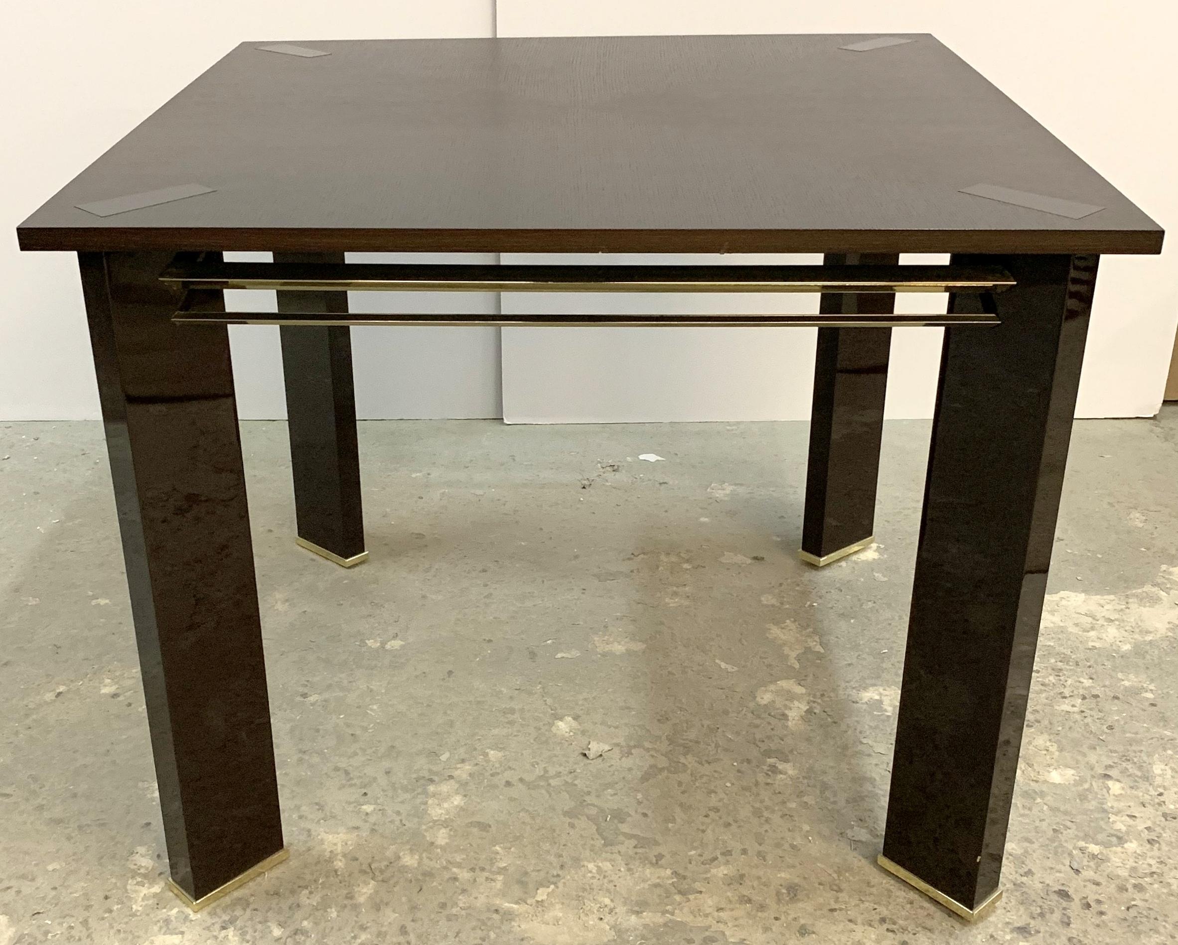 A wonderful Mid-Century Modern ashwood and brown lacquered game table with polished bronze finishes
Purchased from Lorin Marsh.
