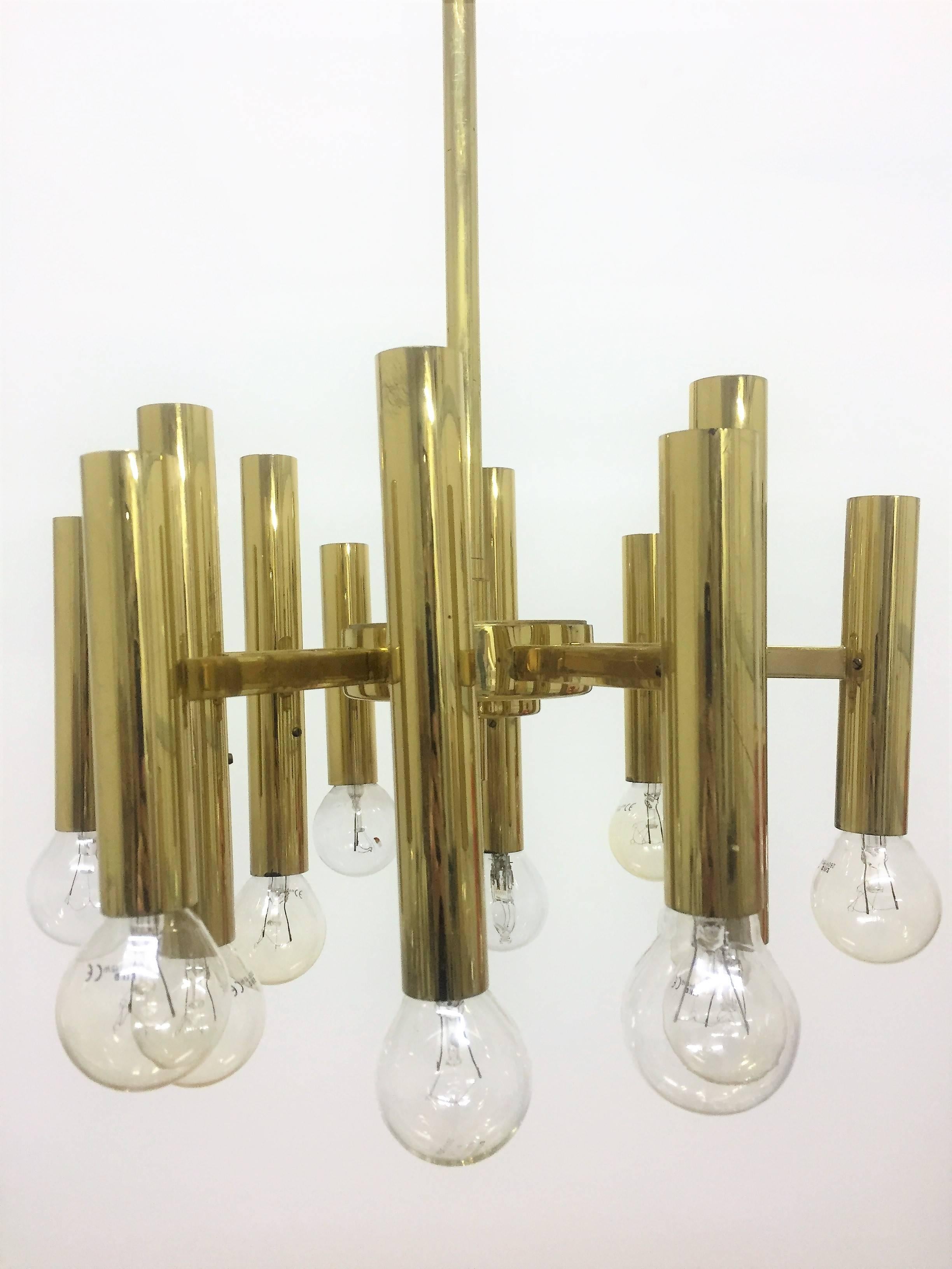 Gilt brass midcentury chandelier by Palwa, Germany circa 1960s.
Socket: 12 x e 14 (Edison) for standard screw bulbs.
