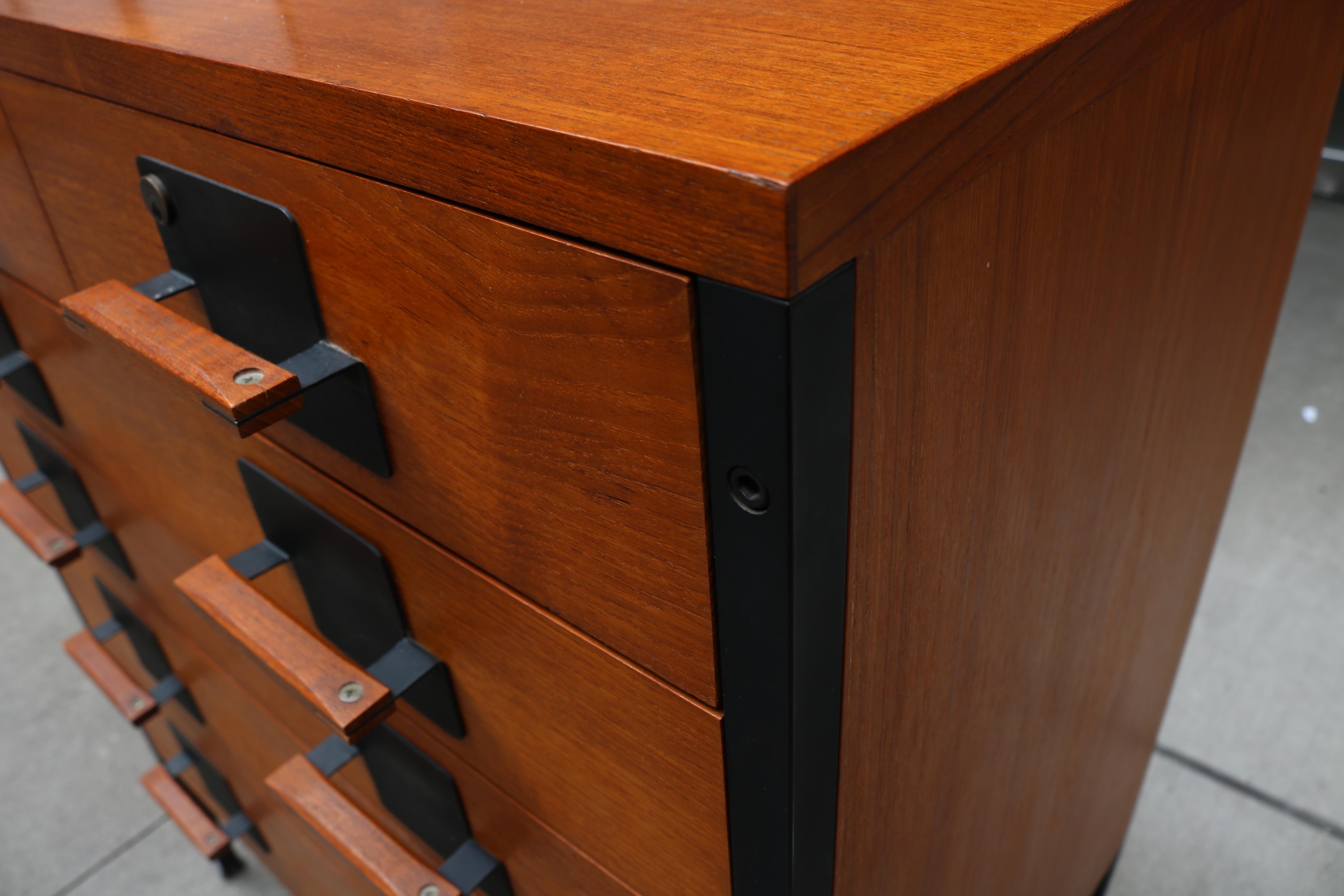 A fine modernist chest by Ico Parisi for MIM. 
Black painted metal details.