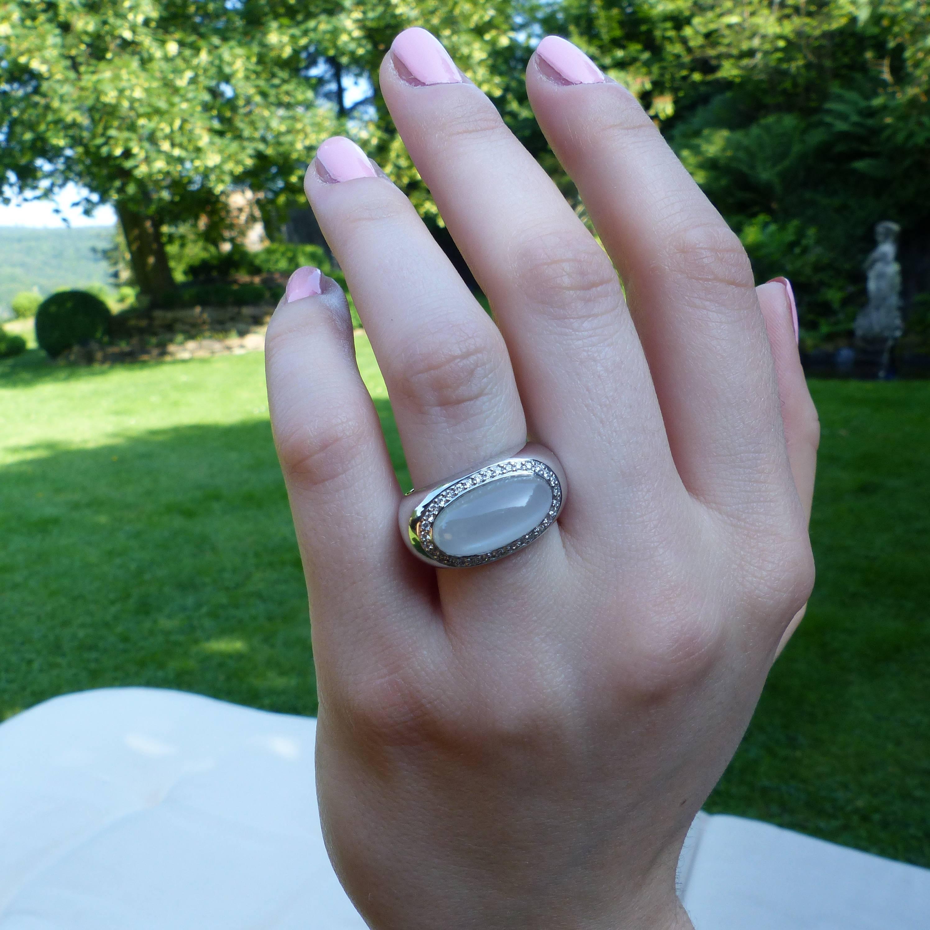 Contemporary Ring in White Gold with 1 Moonstone Cabouchon oval 16x8mm and Diamonds. For Sale