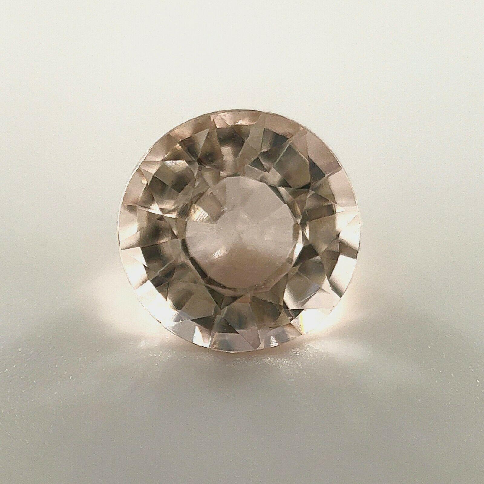 Fine Morganite 1.82ct Peach Orange Pink Beryl Round Cut 8mm Loose Gemstone

Fine Natural Morganite Gemstone.
1.82 Carat with a beautiful pink orange peach colour and excellent clarity. Also has an excellent round cut with excellent proportions and