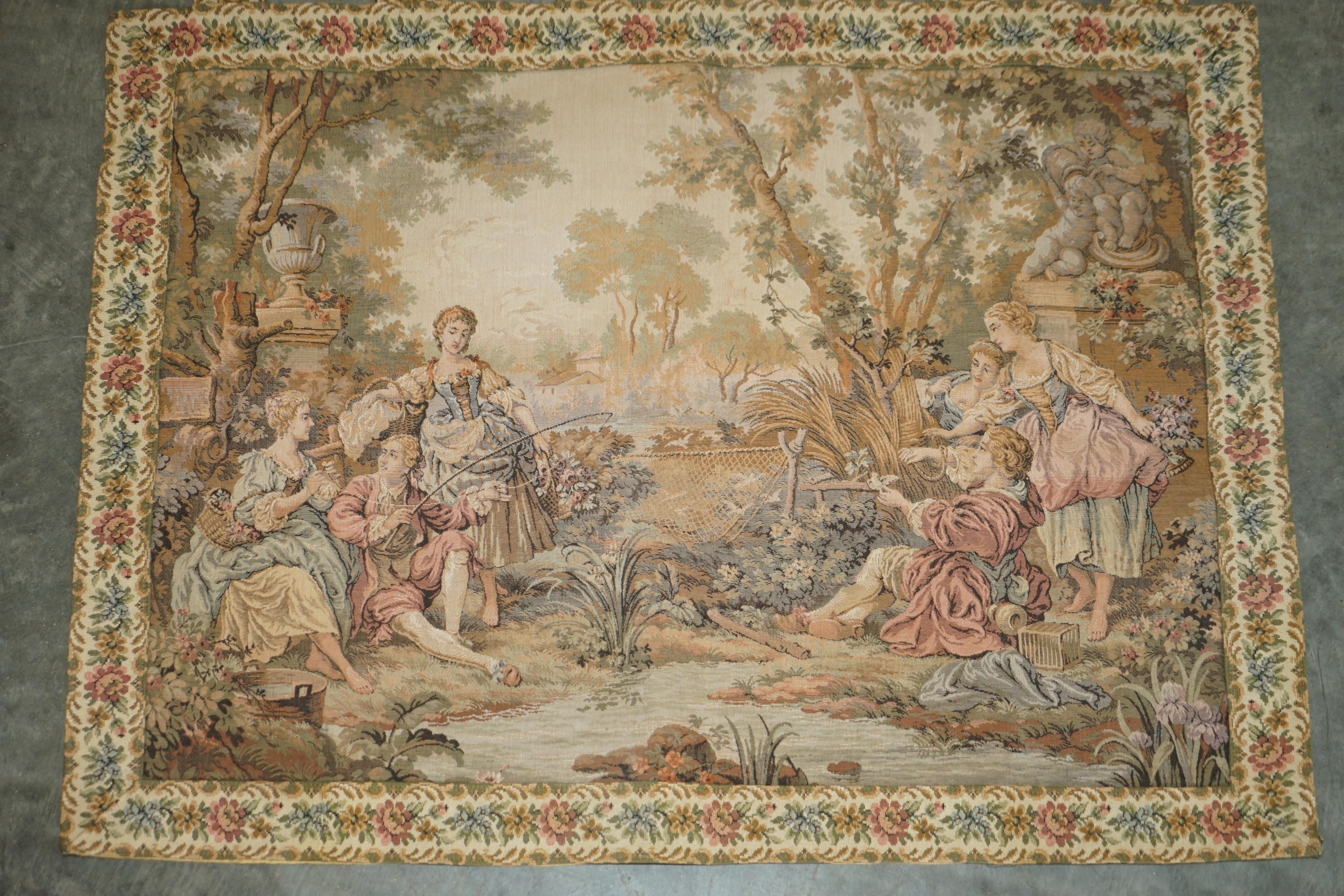 We are delighted to offer for sale this lovely Napoleon III circa 1860 hand made in France, Embroidered Tapestry depicting a lovely detailing summer fishing scene which is very romantic.

A very good looking and decorative piece. This is an a