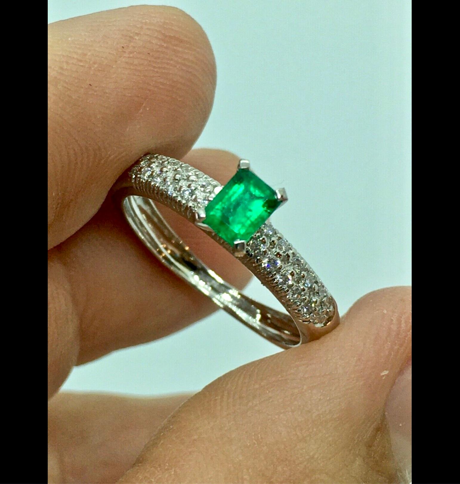 A Fine Natural Colombian Emerald Pave Diamond Engagement Ring 18K White Gold
Center High-Quality Natural Colombian Emerald, Emerald Cut 0.50 Carat, Vivid Medium intense Green
Side Natural Micro pave set Diamonds 0.40 Carat, Clarity VS, Color