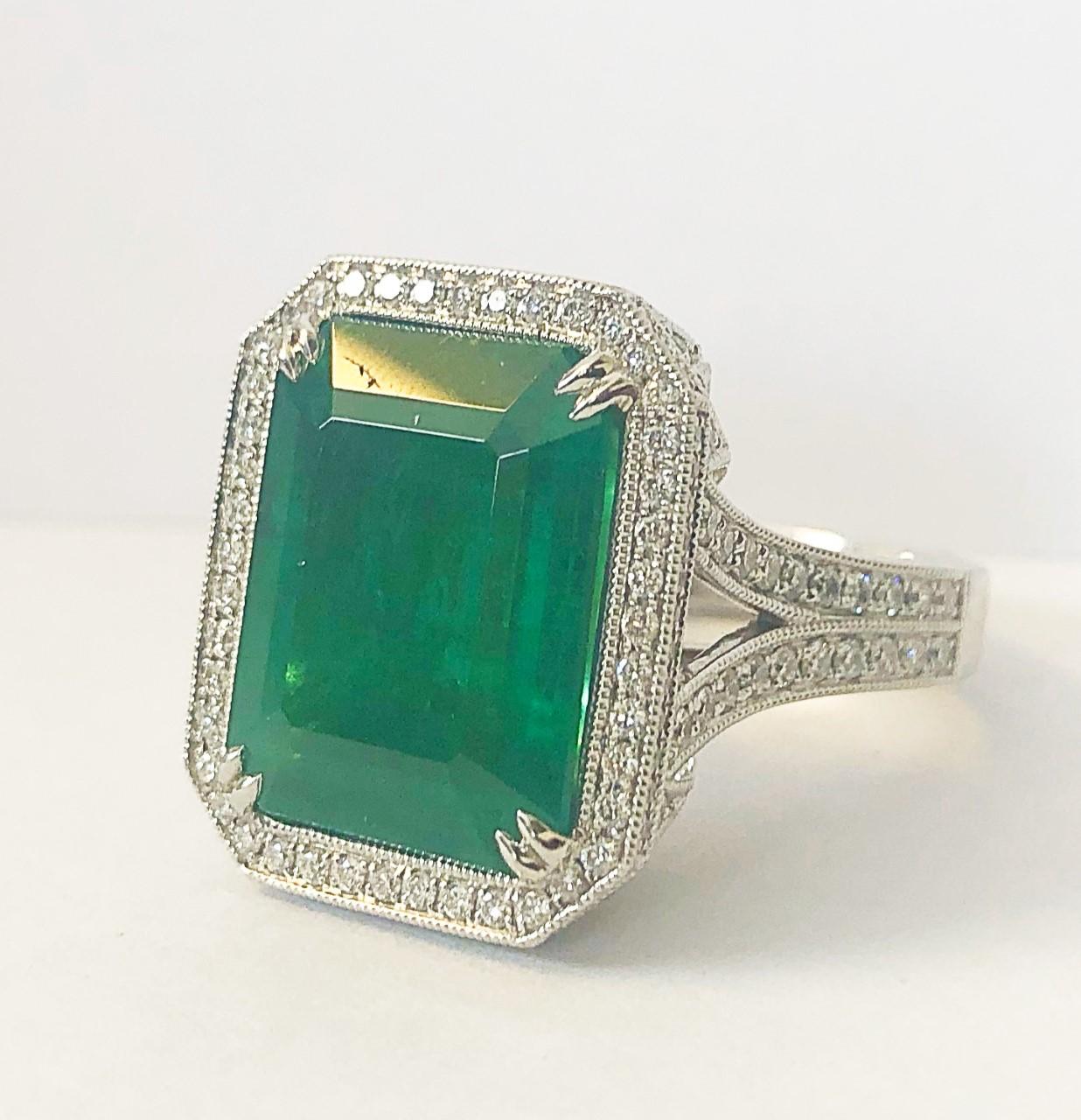 Fine Emerald and Diamond Ring 
Set with an octagonal emerald weighing approximately 12.42 carats, set in Platinum and 18kt yellow gold with 172 near colorless round brilliants.
Accompanied by GIA report no. 2191893414, dated 14th December 2018
21.72