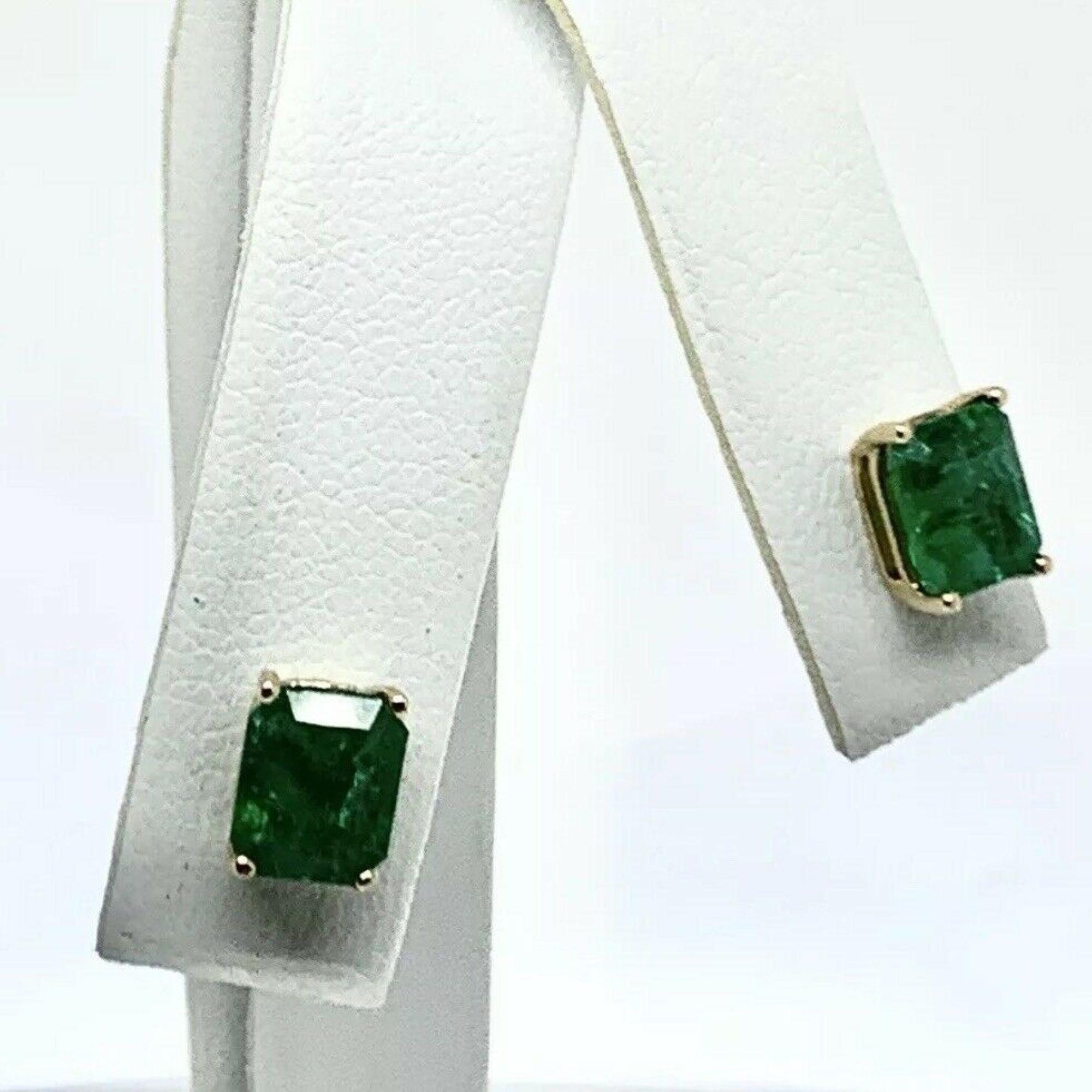 Certificate #201915316 YG  $2,450

This is a Certified Authentic Fine NATURAL Emerald 14 kt Solid Yellow Gold Stud Earrings with a total weight of 1.40 grams.

Beautiful  Earrings. Making Them Suitable For Any Occasion!!!
This is a One of a Kind