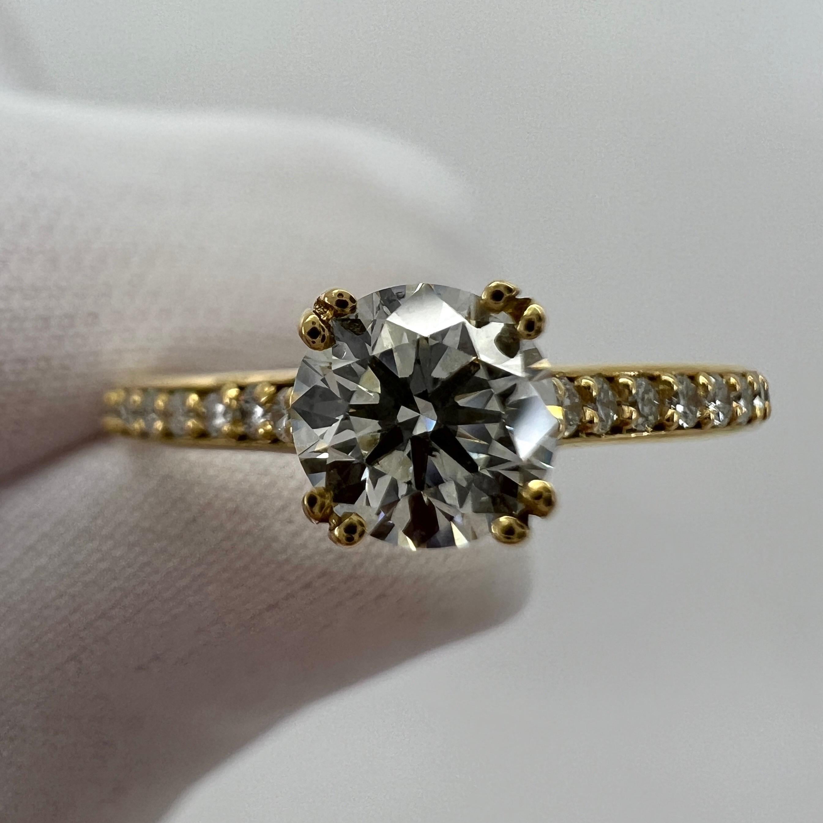 Fine Natural Round Brilliant Cut White Diamond 18k Yellow Gold Ring With Diamond Accents.

Fine 5.1mm natural diamond centre with SI1 clarity,  G/H colour and an excellent round brilliant cut. 0.53 Carat. Very sparkly gem with top proportions and