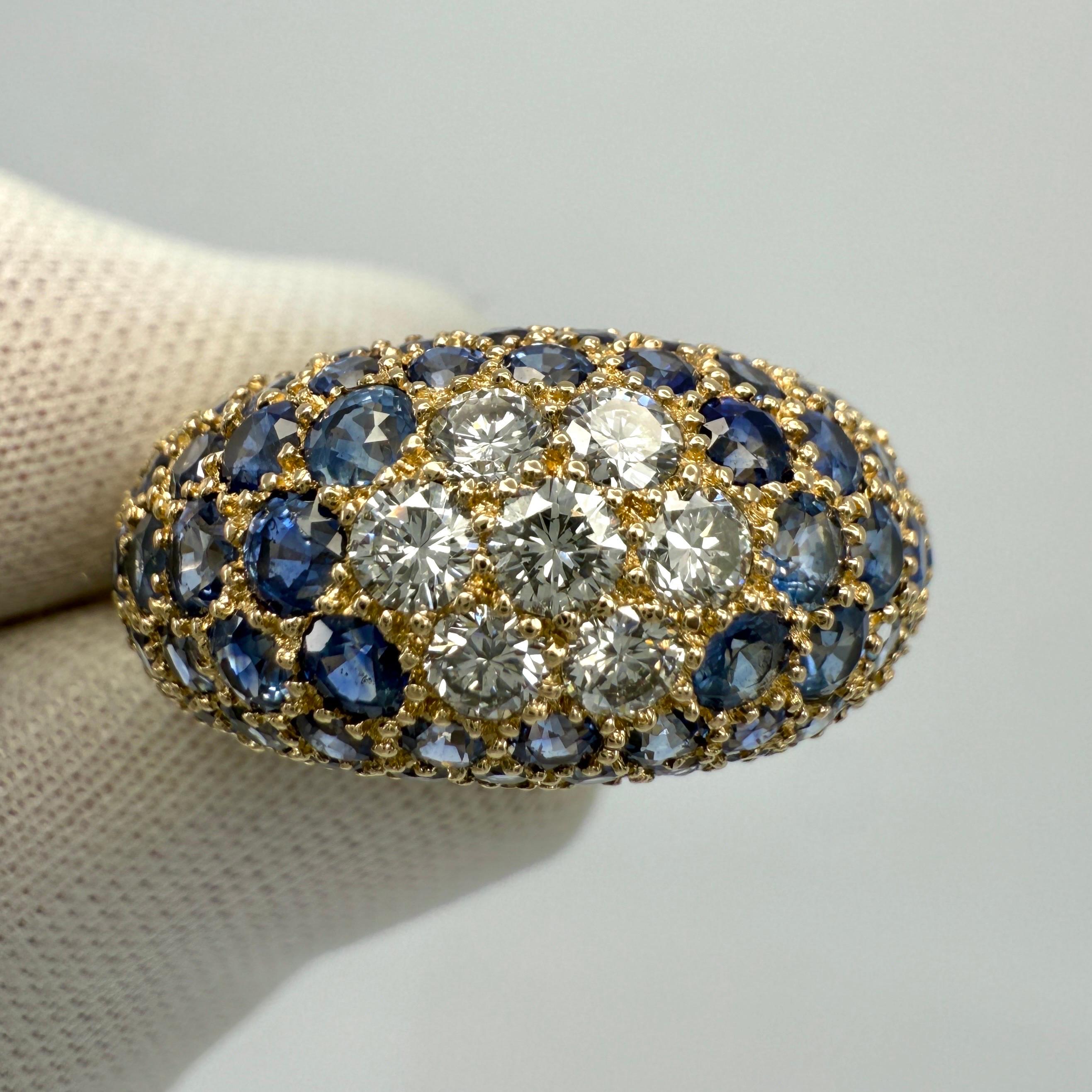 Raffinato anello da cocktail con zaffiro naturale e pavé di diamanti in oro giallo 18 carati.

Un anello di ottima fattura con pietre calibrate e superbamente abbinate di eccellente qualità. Incastonato in una composizione floreale a