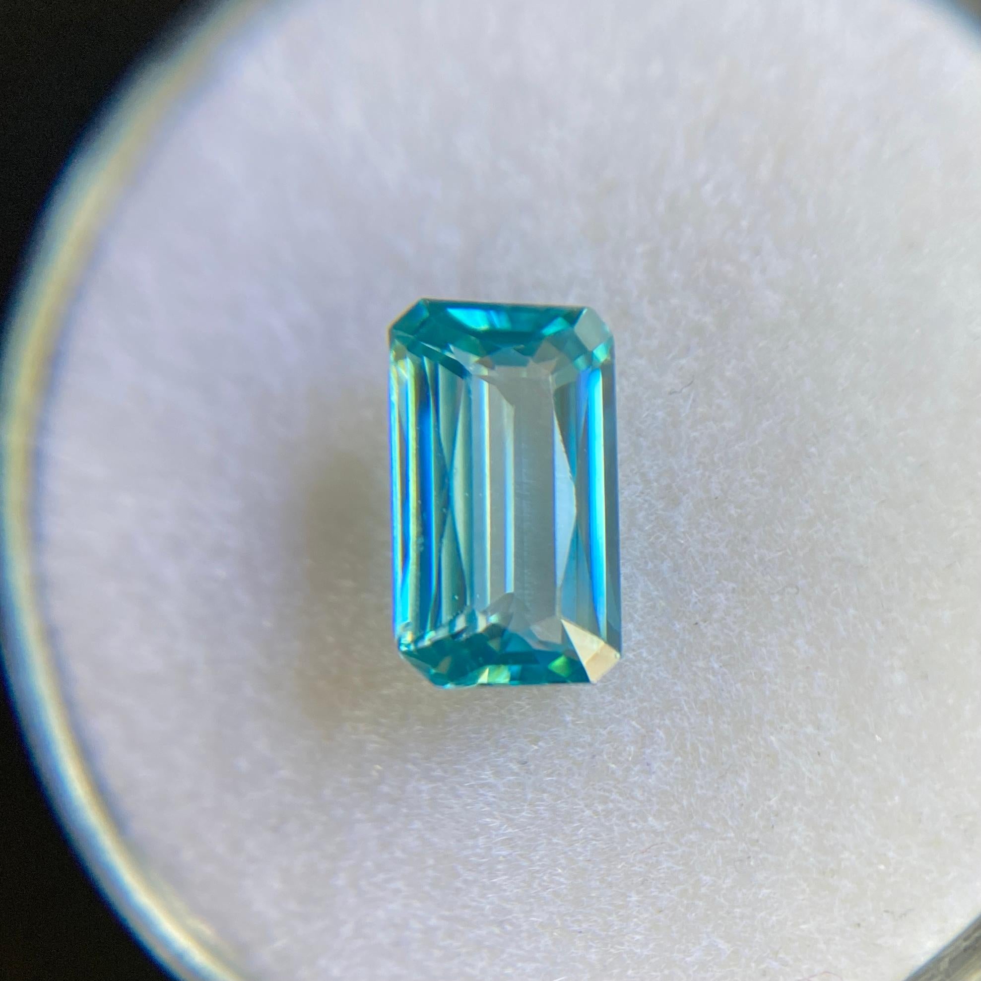 Fine Natural Loose Blue Zircon Gemstone.

Stunning 1.71 carat stone with a beautiful vivid blue colour and excellent clarity. Practically flawless.

Also has an excellent emerald cut with good proportions and symmetry. This shows lots of brilliance,