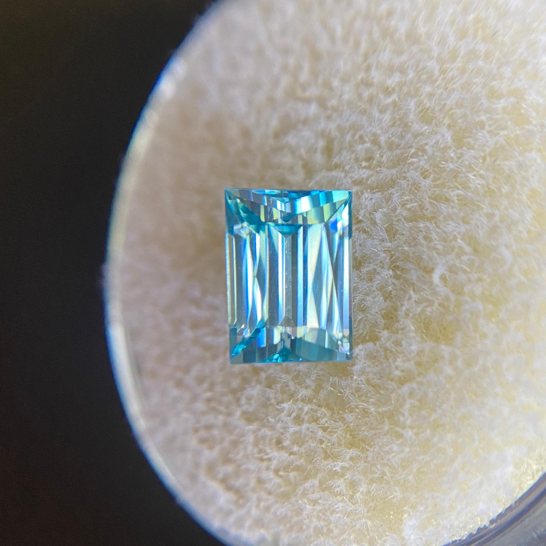 Fine Natural Loose Blue Zircon Gemstone.

Stunning 2.38 carat stone with a beautiful vivid blue colour and very good clarity. A clean stone with only some small natural inclusions visible when looking closely.

Also has an excellent fancy baguette