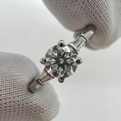 Fine Natural White Diamond Platinum Round Tapered Baguette Cut Three Stone Ring