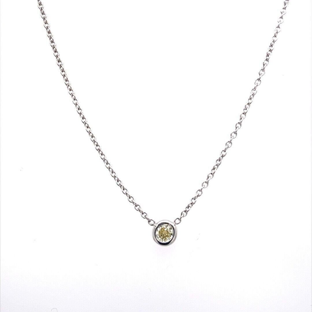 Fine Natural Yellow 0.10ct Diamond Pendant In 18ct White Gold Rubover Setting

Additional Information:
Total Diamond Weight: 0.10ct 
Diamond Colour: Yellow
Diamond Clarity: VS
Total Weight: 1.7g
Length : 16''/18''
SMS2859