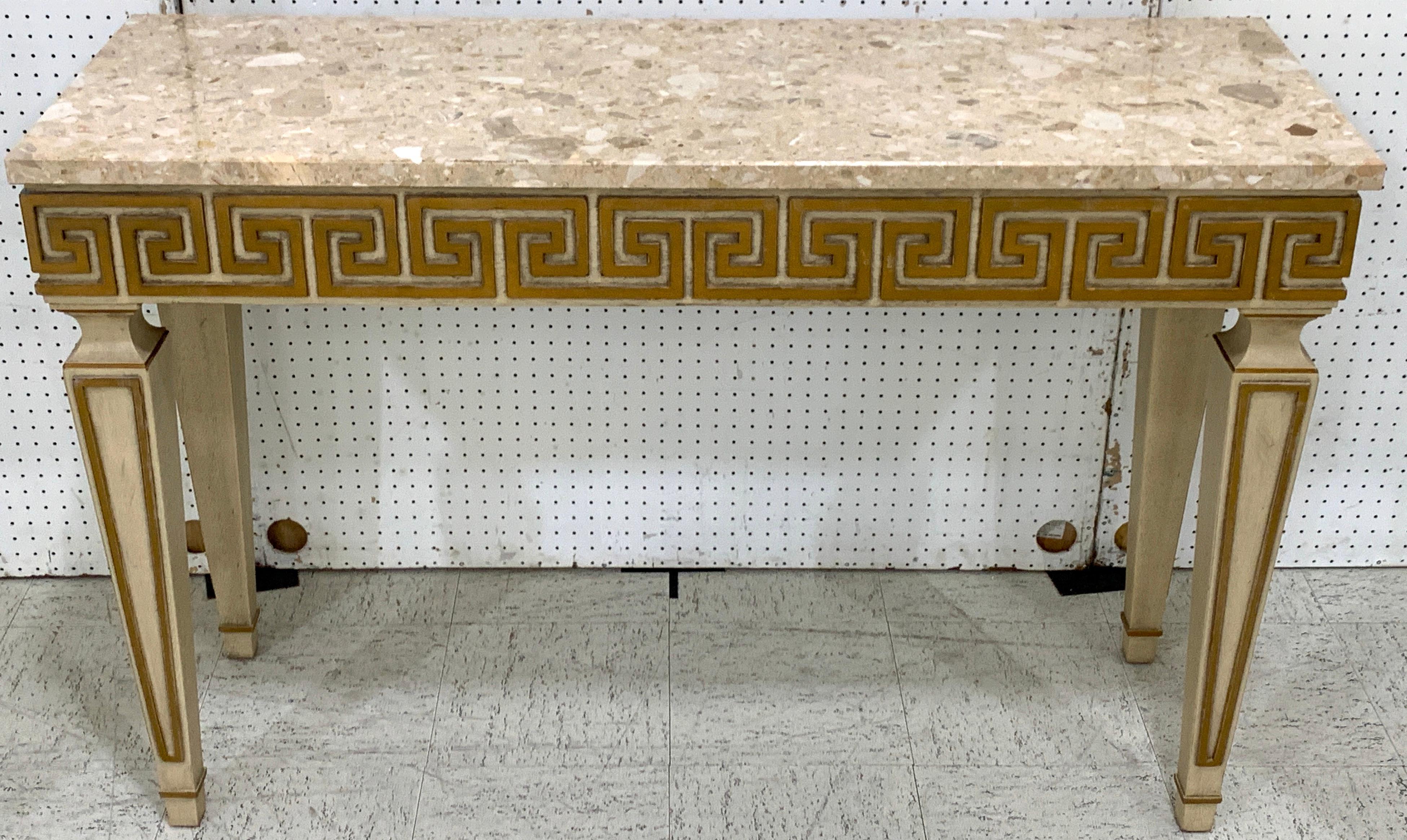 Fine Greek Key gilt and polychrome marble-top console, with beautiful subtle neutral well figured marble top, raised on a base with continuous Greek Key frieze, (Greek Key decoration is on all sides of the console) with tapering Marlborough legs.