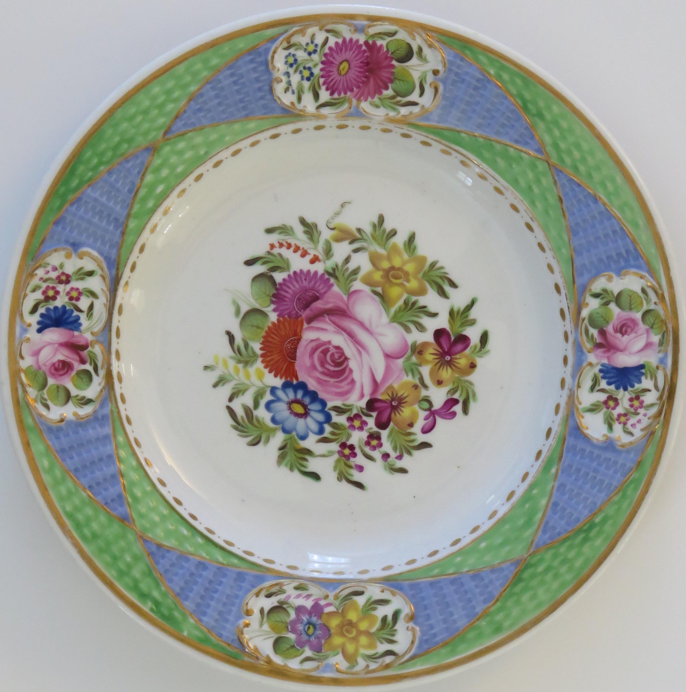 This is a beautiful desert plate by Newhall, dating to the turn of the early 19th century, Georgian period, circa 1820.

The piece is very well potted on a low foot and a moulded basket work border to the cavetto.

The plate is finely hand