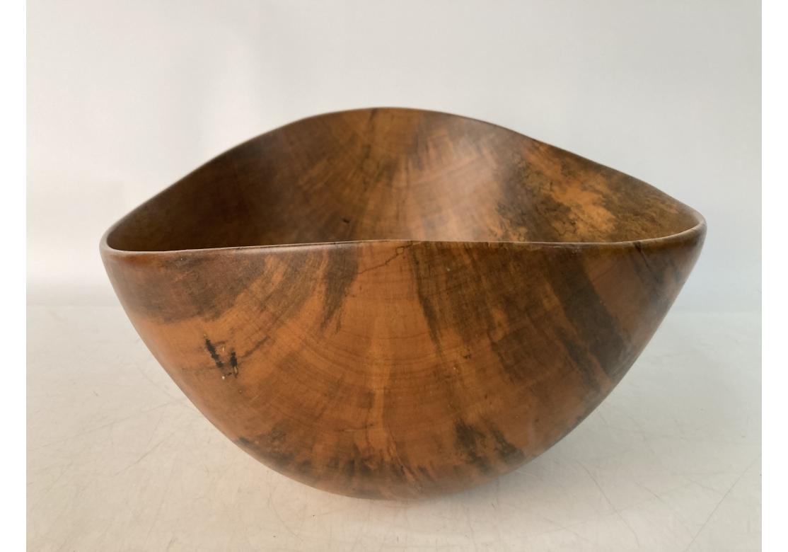A particularly fine Organic Modern Bowl by celebrated American wood artist David Auld. Crafted in Haiti, and one of his larger pieces, Mr. Auld’s Bowls combine a mastery of craftsmanship with a sculptor’s sensibility and remain outstanding examples