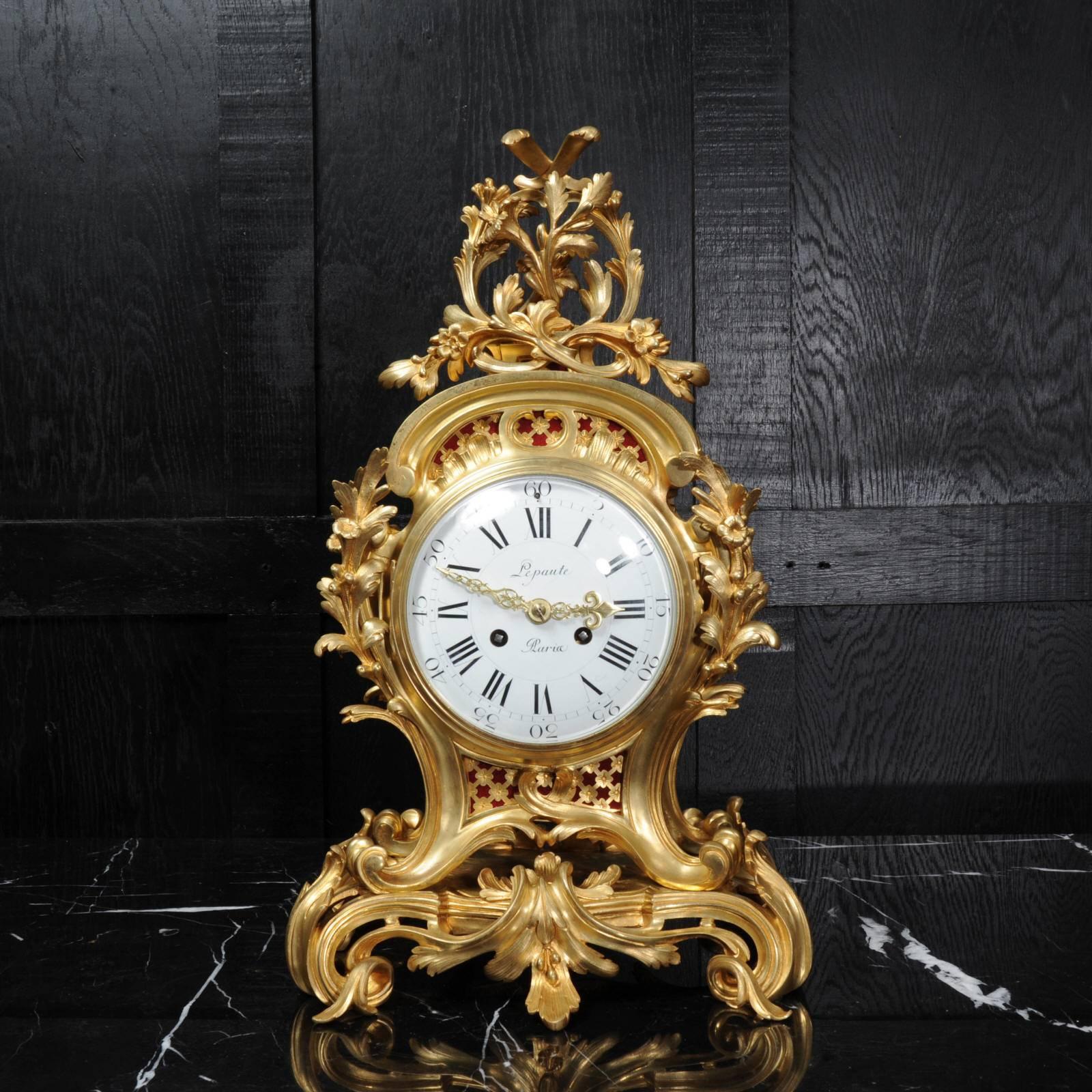 A large and very fine quality ormolu Rococo clock by Henry Lepaute of Paris, part of the illustrious Lepaute clockmaking dynesty. Formed in finely gilded bronze, sinuous scrolls and curves form the case with delicately modeled floral and foliate