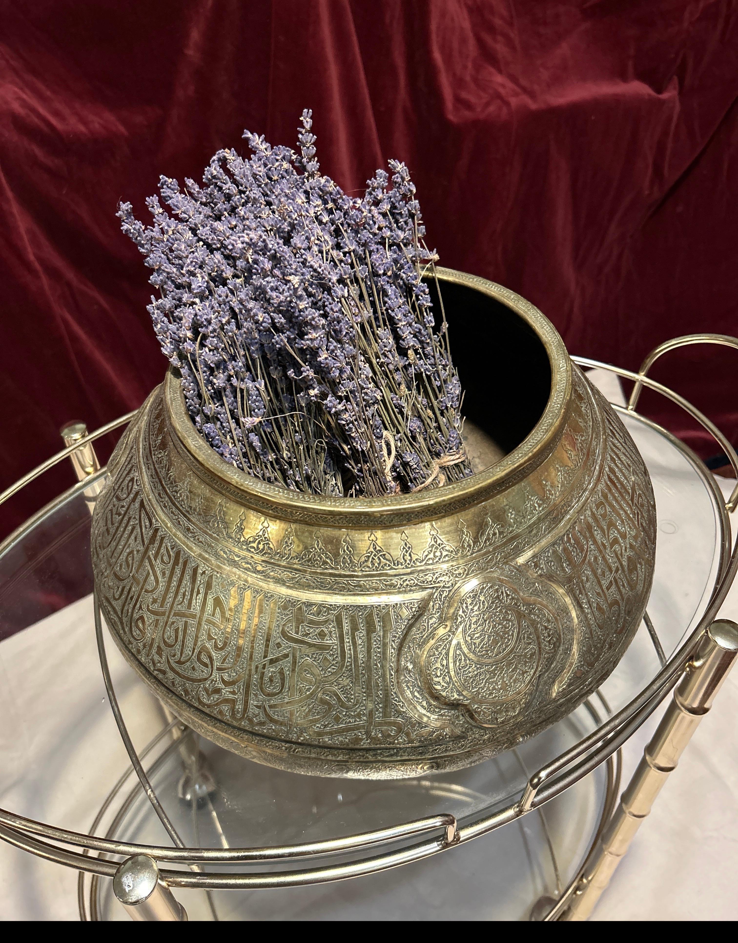 Refined hand engraved large brass Ottoman vessel with verses from the Quran intermingled with raised and depressed intricate carvings. Good original condition. A superb work of art from a bygone era of metal-smithing.