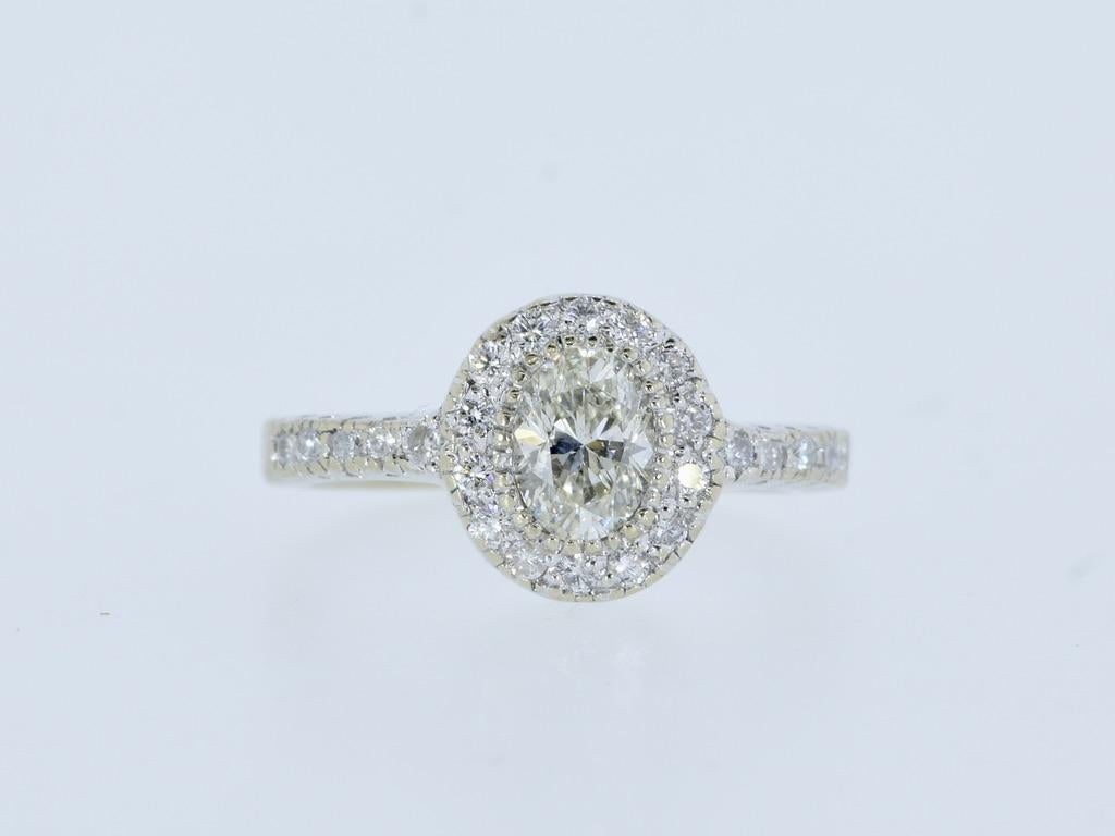 Feiner ovaler Diamantring im Halo-Stil aus 18 Karat mit 1,50 Karat, um 2000 im Angebot 2