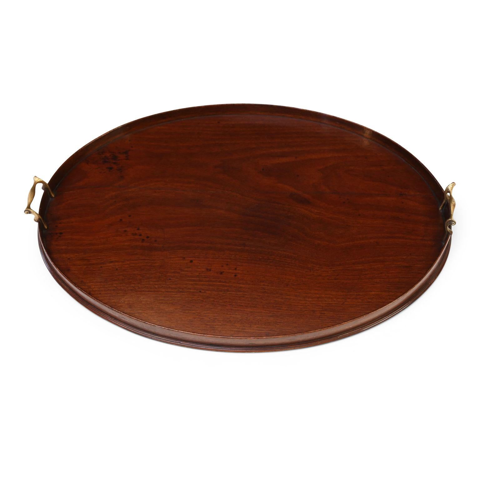 Fine oval shape Georgian mahogany tray, (circa 1780-1800). Original cast brass handles. Excellent condition.