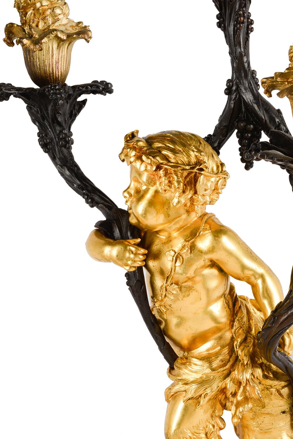 Fine Pair of 19th Century Cherub Candelabra on Porphyry Bases In Good Condition For Sale In Brighton, Sussex