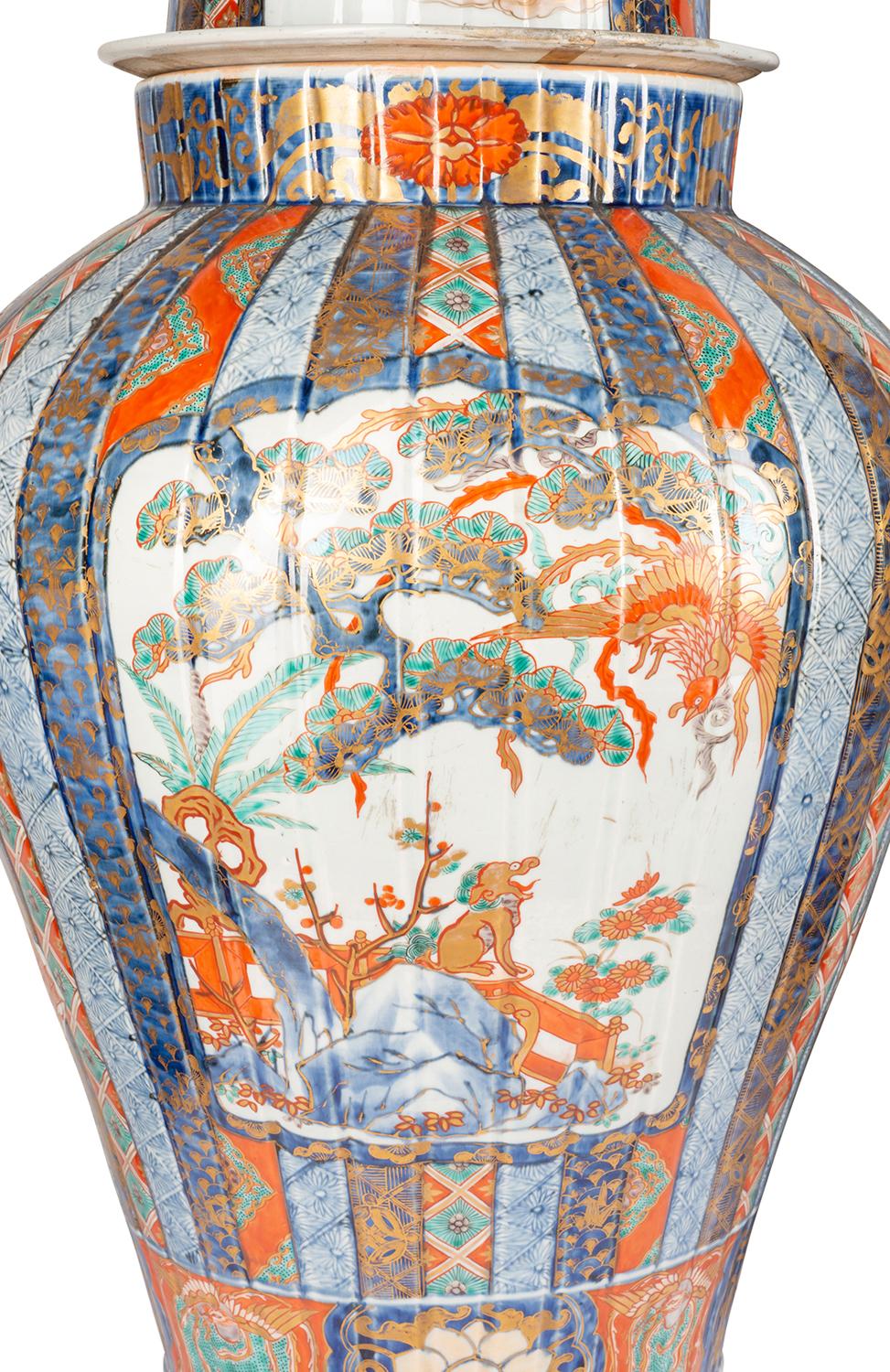 Hand-Painted Fine Pair of 19th Century Japanese Imari Lidded Vases For Sale