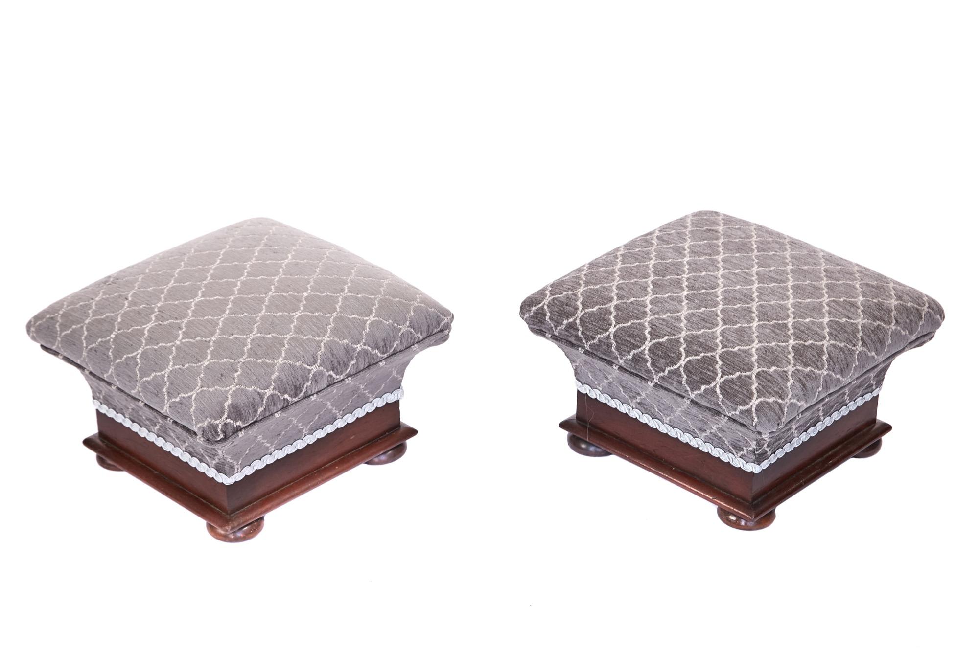 Fine pair of antique Victorian mahogany foot stools having attractive bun shaped turned feet, newly 
re-upholstered in a quality grey color stylish fabric.

In lovely condition.


  