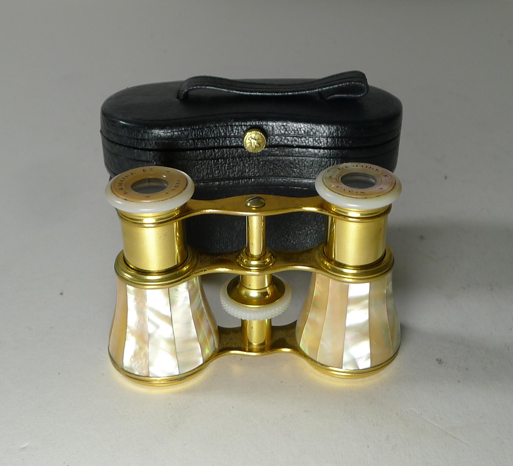 A very fine pair of late nineteenth century opera glasses made from Mother of Pearl and the original gilded brass; made by the creme de la creme of makers, LeMaire of Paris.

The makers mark (the Napoleonic Bee) is engraved on the underside of