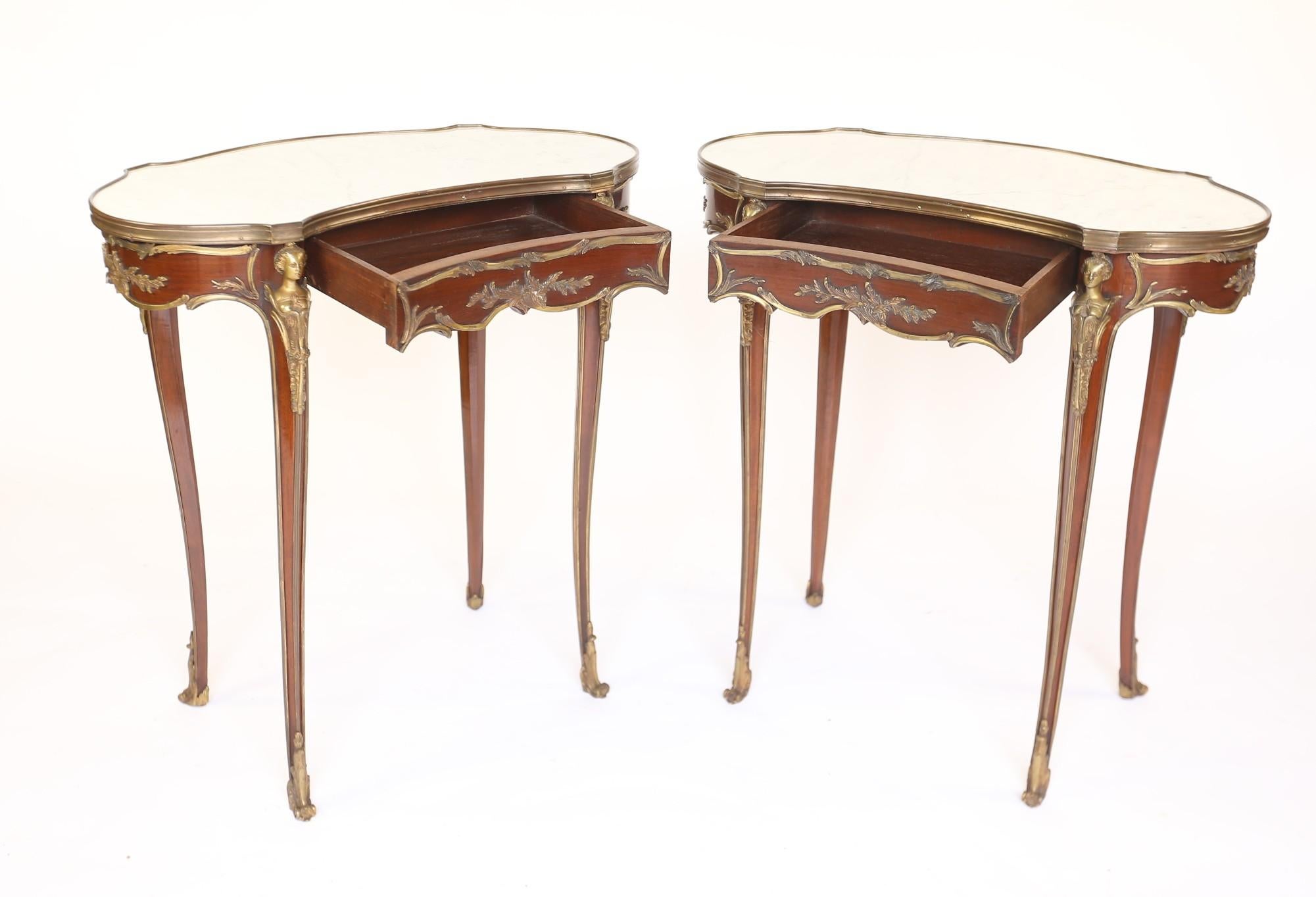 Fine Pair French Amaranth, Marble & gilt Lamp Tables. circa 1920s
Inset White Carrara Marble Tops, Recently Replaced,
the Original marble tops badly Cracked & Damaged,
Gilt  Brass Gallery around Marble tops 
Amaranth Veneer, 
Good quality Gilt brass