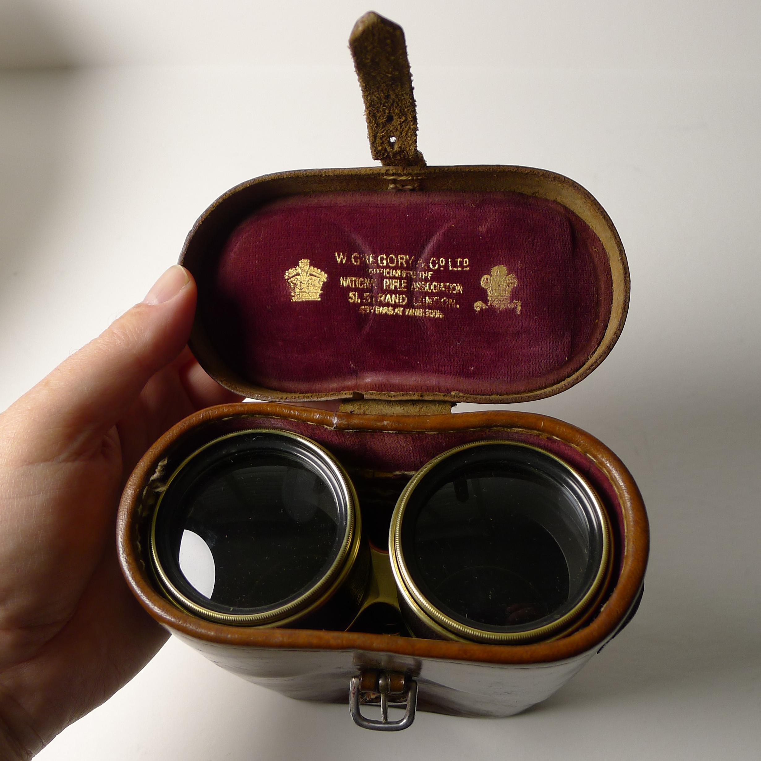 A superb pair of antique binoculars made from brass and clad in leather, meticulously and professionally cleaned and polished, restoring them to their former glory. They have integral sun shades which are pulled out manually when required.

The
