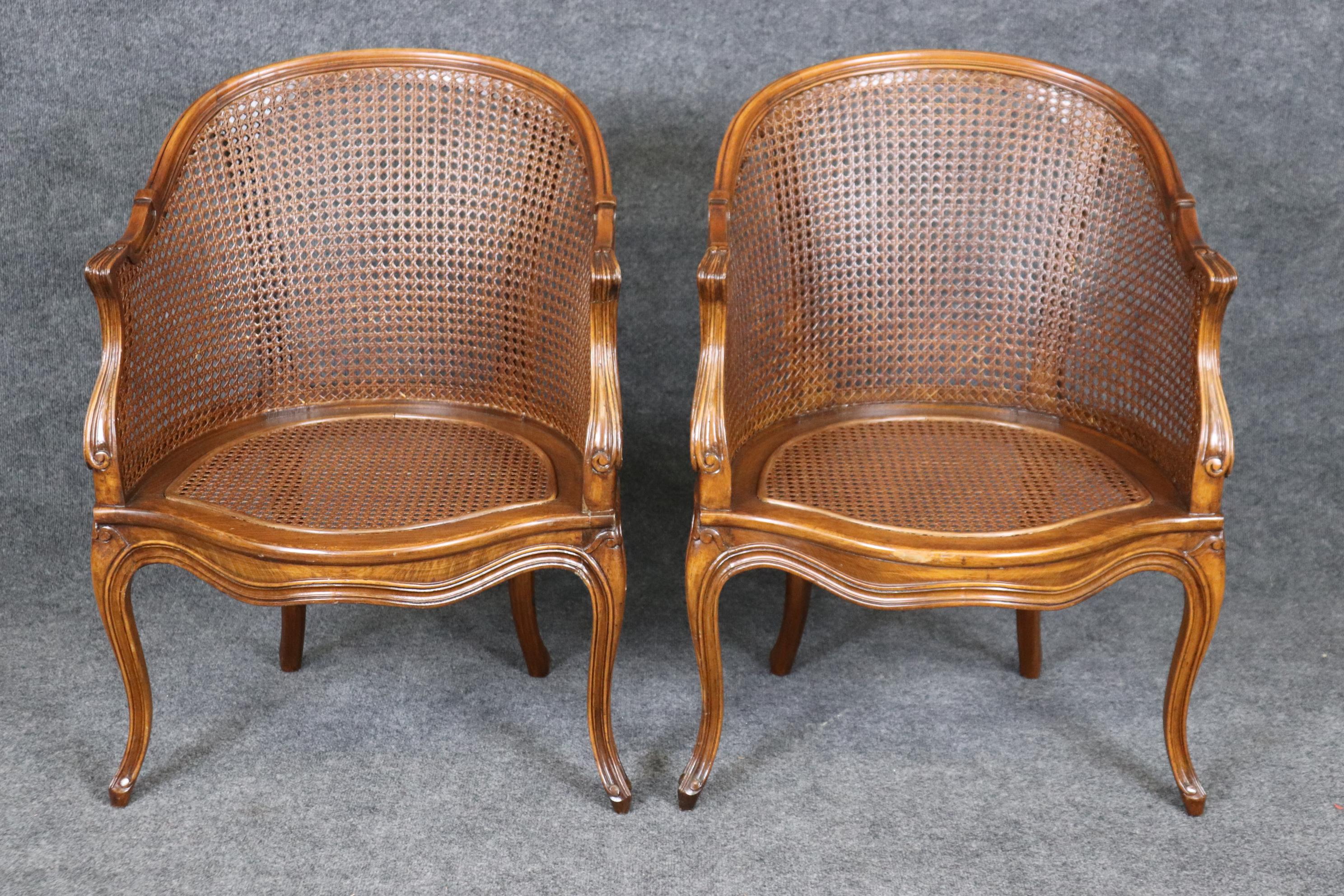 Fine Pair French Louis XV Style Cane Back Bergère Chairs in Walnut Circa 1940s In Good Condition In Swedesboro, NJ