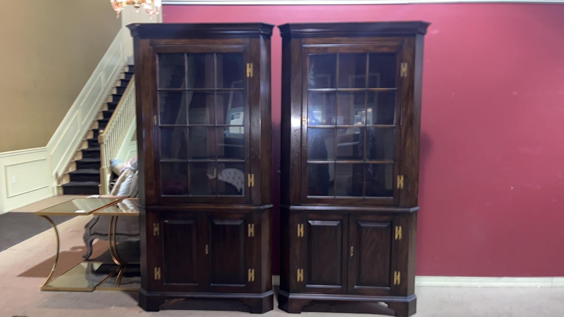 Henkel Harris has always been known as one of America's last great companies that still made furniture in solid mahogany and still used individual glazed glass panes. The cabinets are in good condition with minor scuffs and signs of age and are