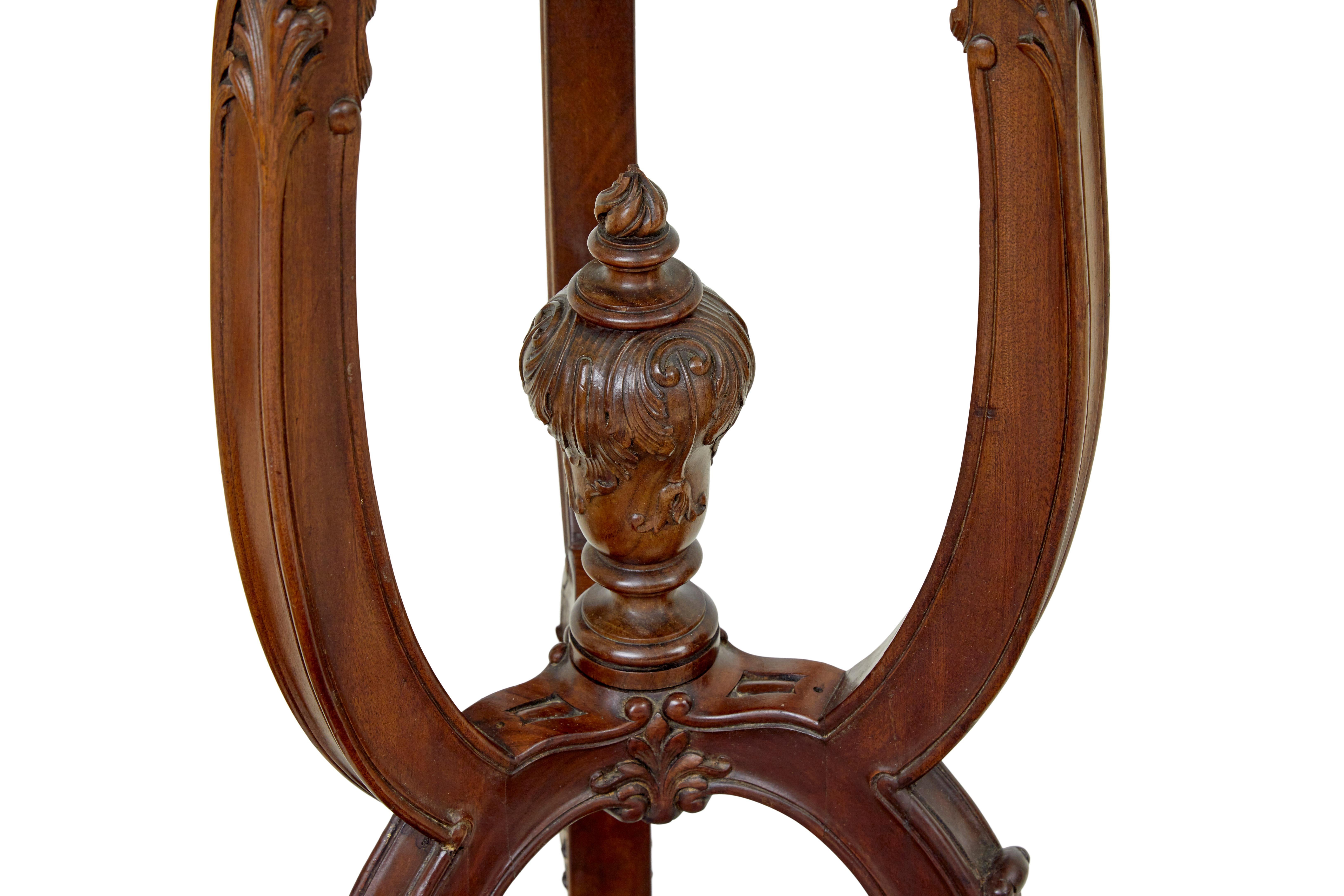 Carved Fine pair of 19th century carved mahogany torcheres by Morison & Co For Sale