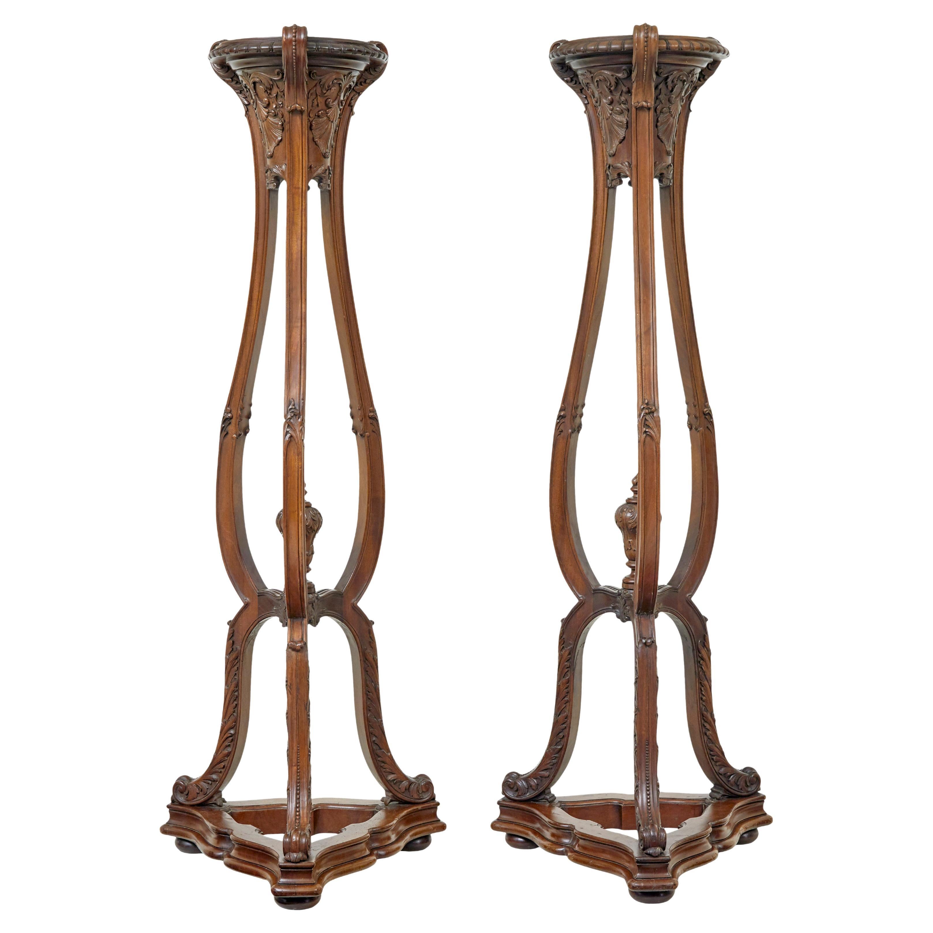 Fine pair of 19th century carved mahogany torcheres by Morison & Co For Sale