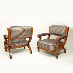 Fine Pair of 19th Century Continental Carved Mahogany Library Armchairs