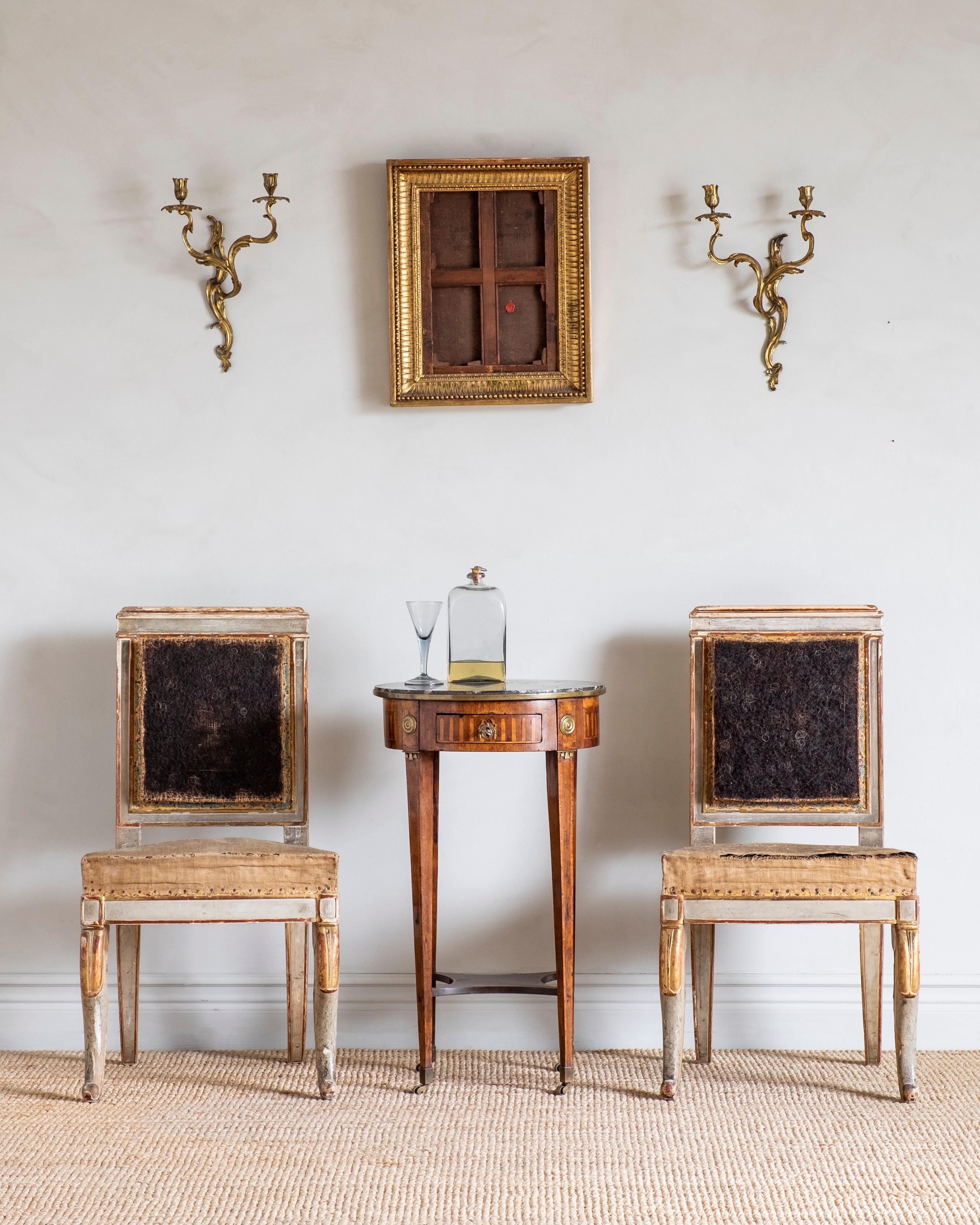 Fine pair of early 19th century Empire side chairs in their original condition, circa 1815, France. 

Good original condition with wear consistent with age and use. Structurally good and sturdy. A detailed condition report is available on request.