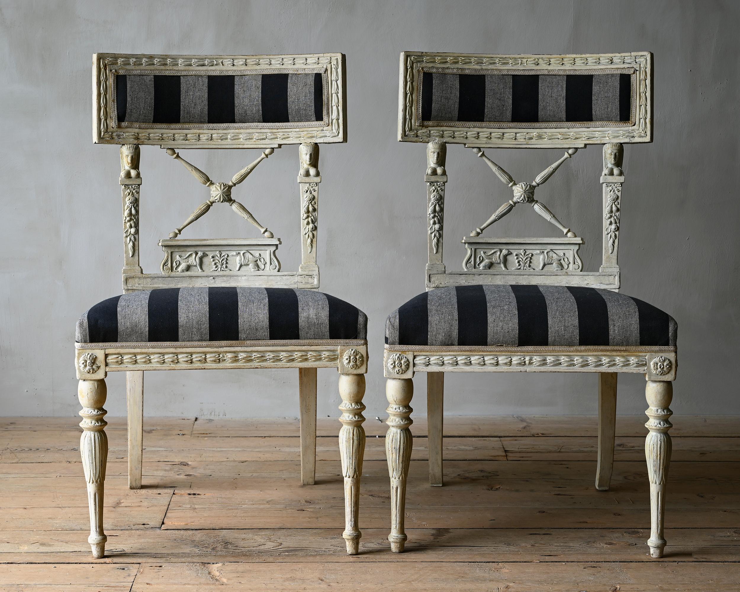 Exceptional pair of early 19th century Swedish / Scandinavian Gustavian chairs in Egyptian taste. Ca 1810 Stockholm, Sweden. 

Attributed to Ephraim Sthal (1767-1820). Supplier to the Royal Court and one of the most sophisticated and inventive