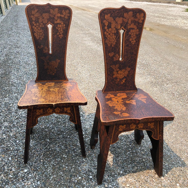 From an important thirty year old New England collection of hand decorated pyrographic Arts & Crafts chairs

This is a beautiful pair of 19th century chairs hand decorated in a lovely 