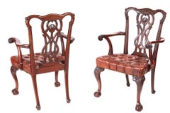 Fine Pair of Antique Carved Mahogany Claw and Ball Elbow or Desk Chairs