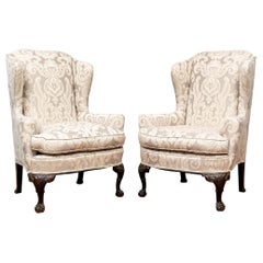 Fine Pair of Antique Carved Wing Chairs