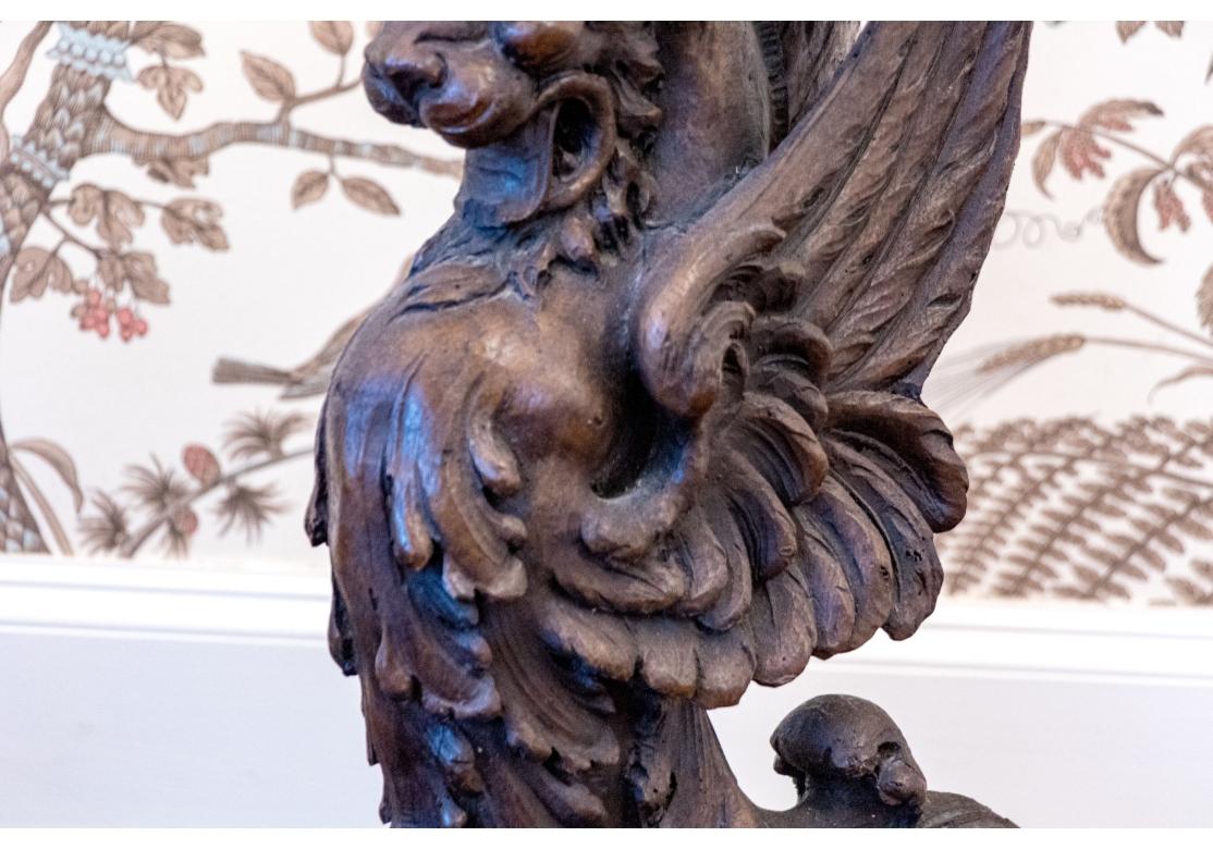 Fine Pair Of Antique Carved Wood Griffin Form Marble Top Side Tables In Distressed Condition For Sale In Bridgeport, CT