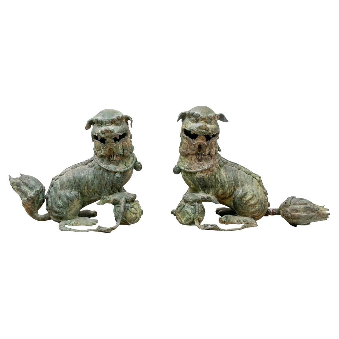 Fine Pair of Antique Chinese Cast Bronze Foo Lion Incense Burners For Sale