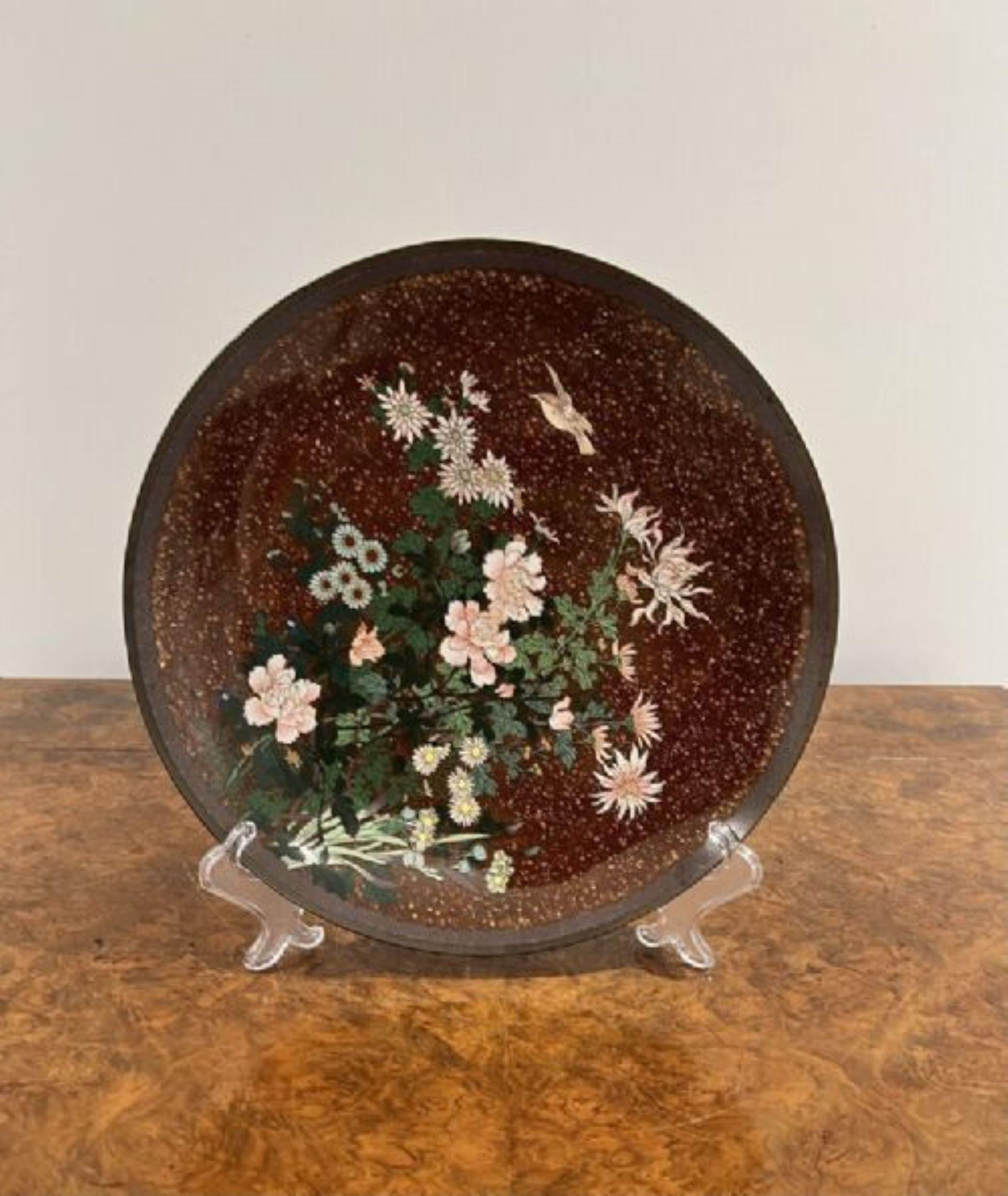Fine pair of antique Japanese cloisonné plates having a fine quality pair of antique Japanese cloisonné plates with red backgrounds and gold fleck inlay with flowers, birds and leaves decorated in wonderful green, pink and blue colours. 