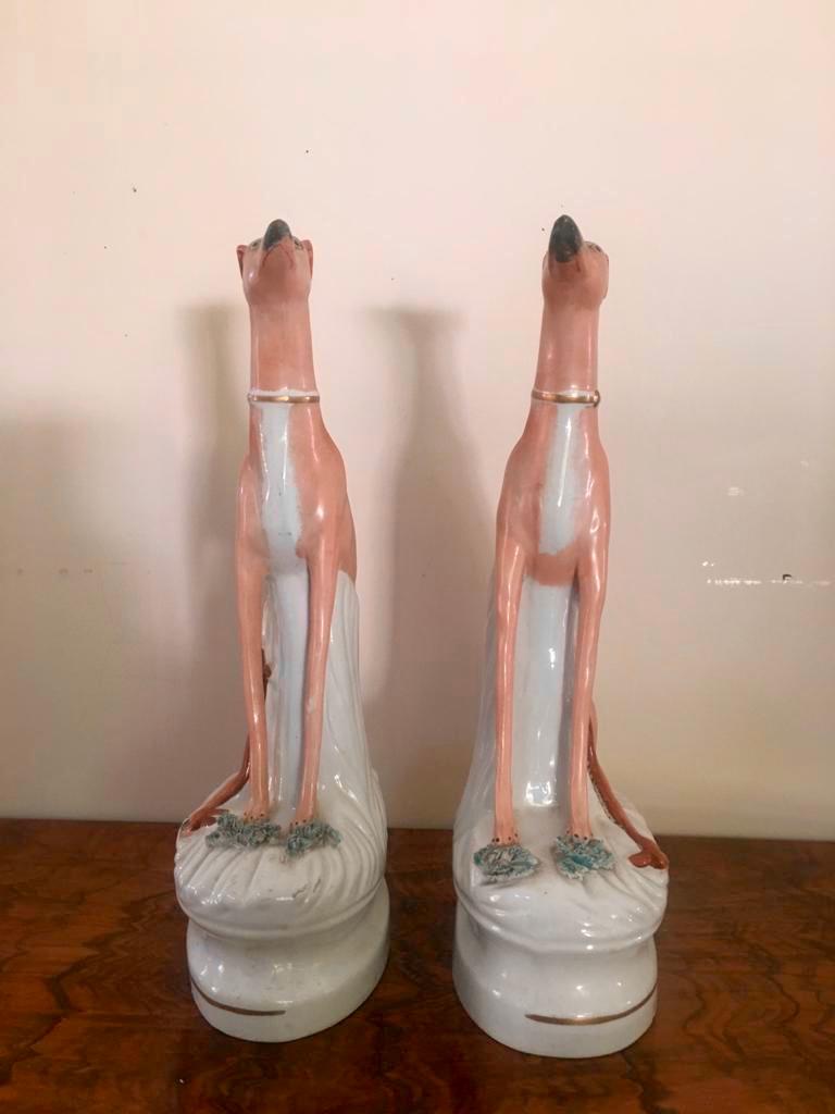 Porcelain Fine Pair of Antique Staffordshire Greyhounds For Sale
