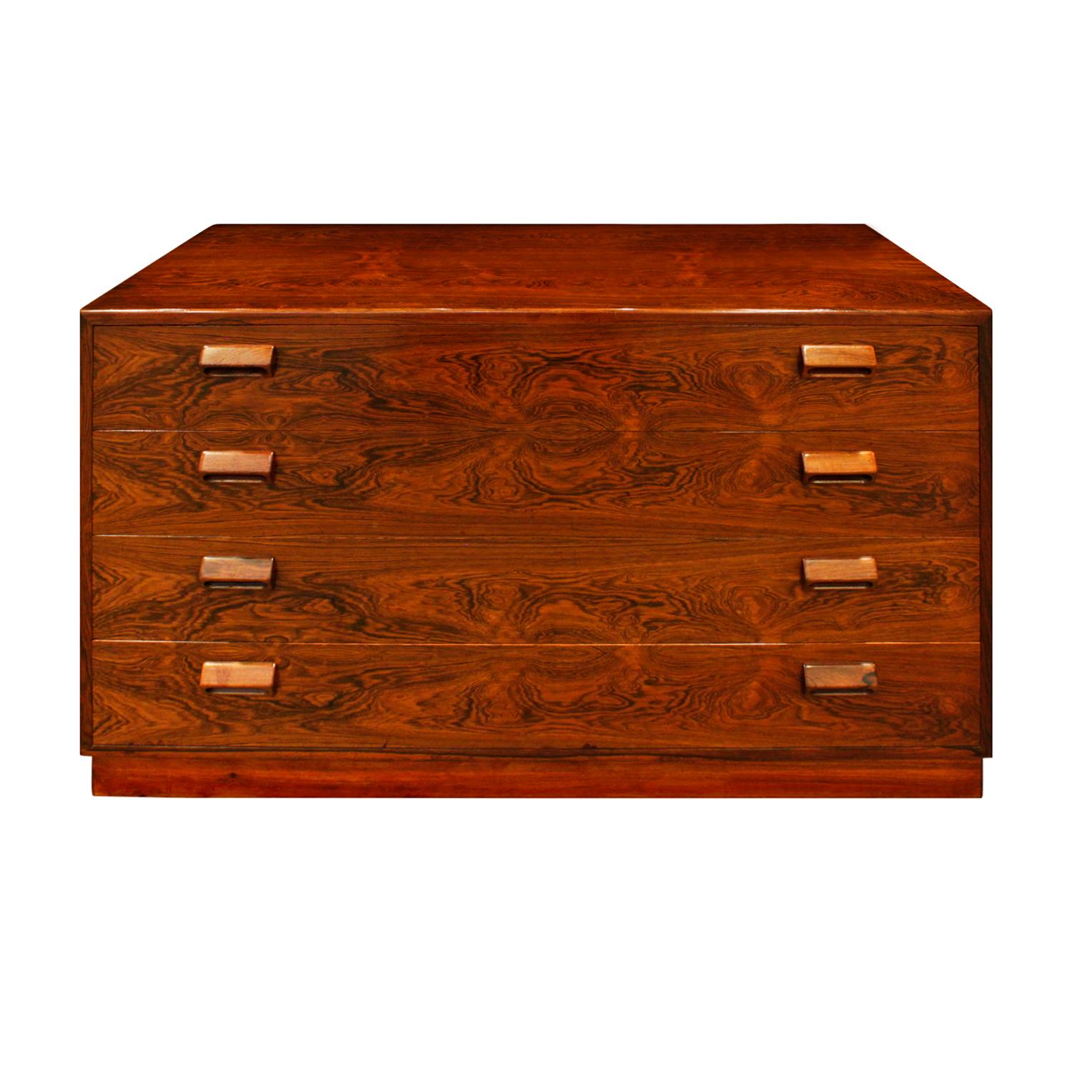 Pair of beautifully crafted bedside tables / chests in Brazilian rosewood with hand carved pulls, Denmark 1950s (stamped “Made in Denmark” on the back). These bedside chests are exquisitely made and very luxurious.