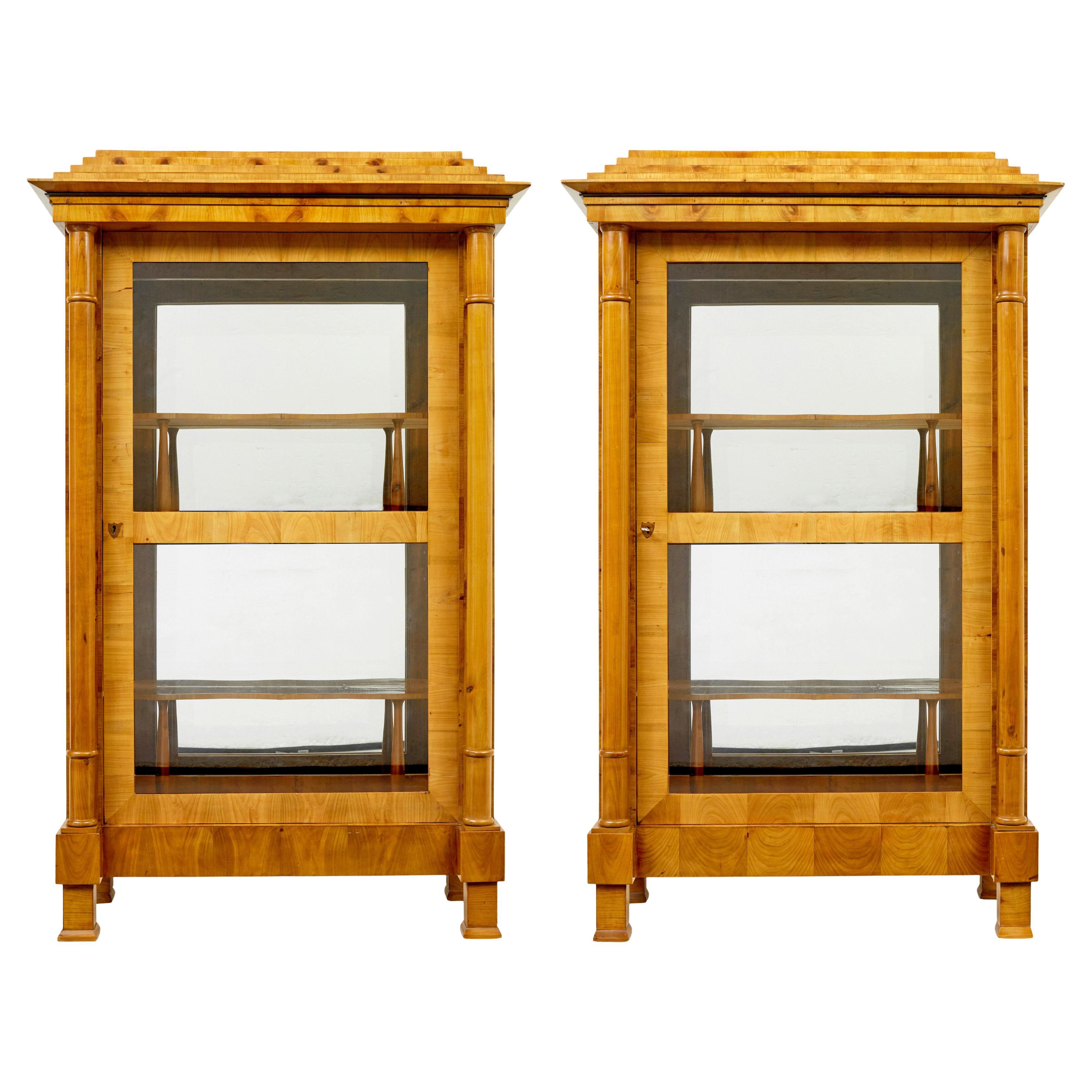 Fine pair of Biedermeier glazed elm display cabinets For Sale