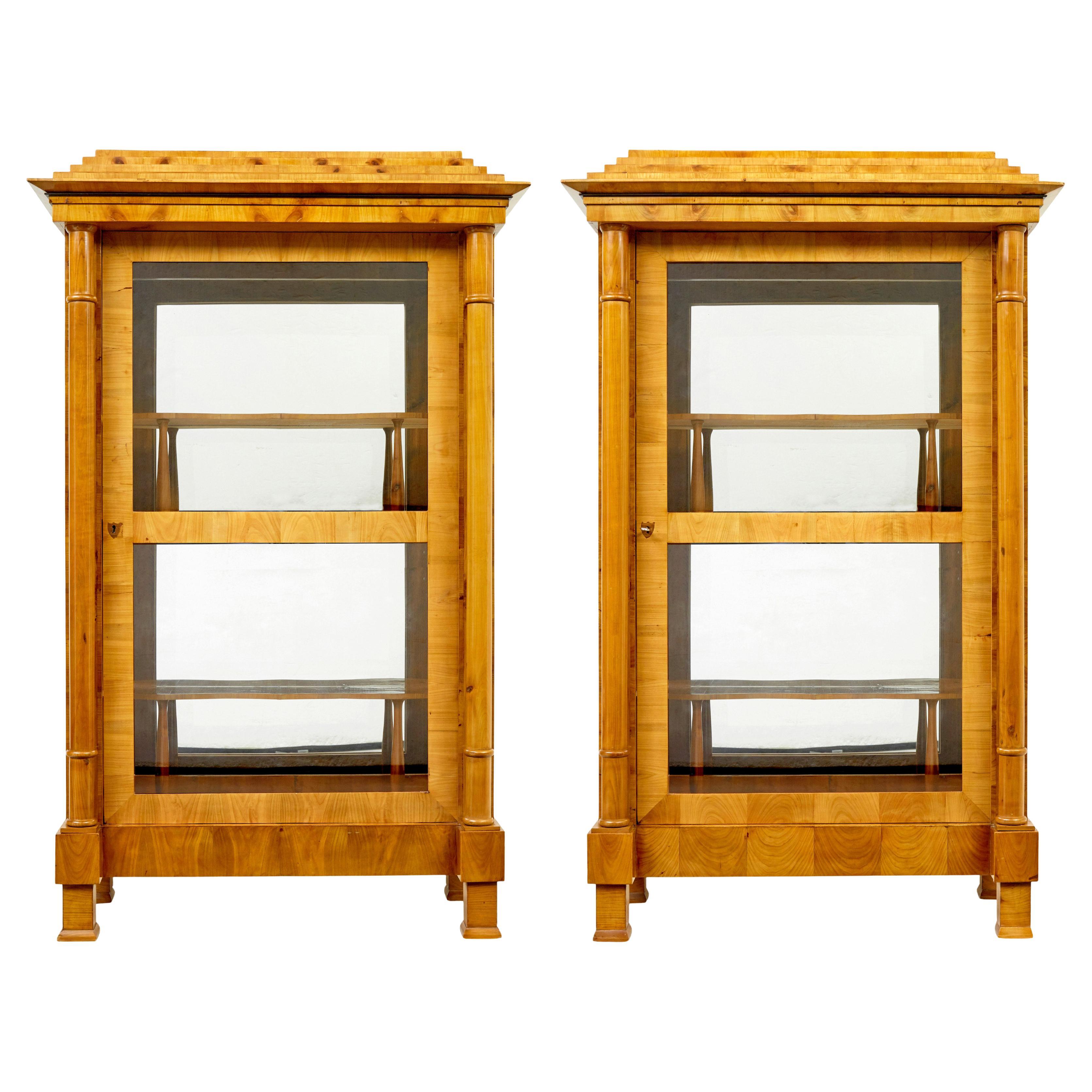 Fine pair of Biedermeier glazed elm display cabinets For Sale