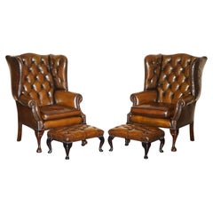 fino par de sillones y reposapiés reclinables de cuero marrón castaño de chesterfield
