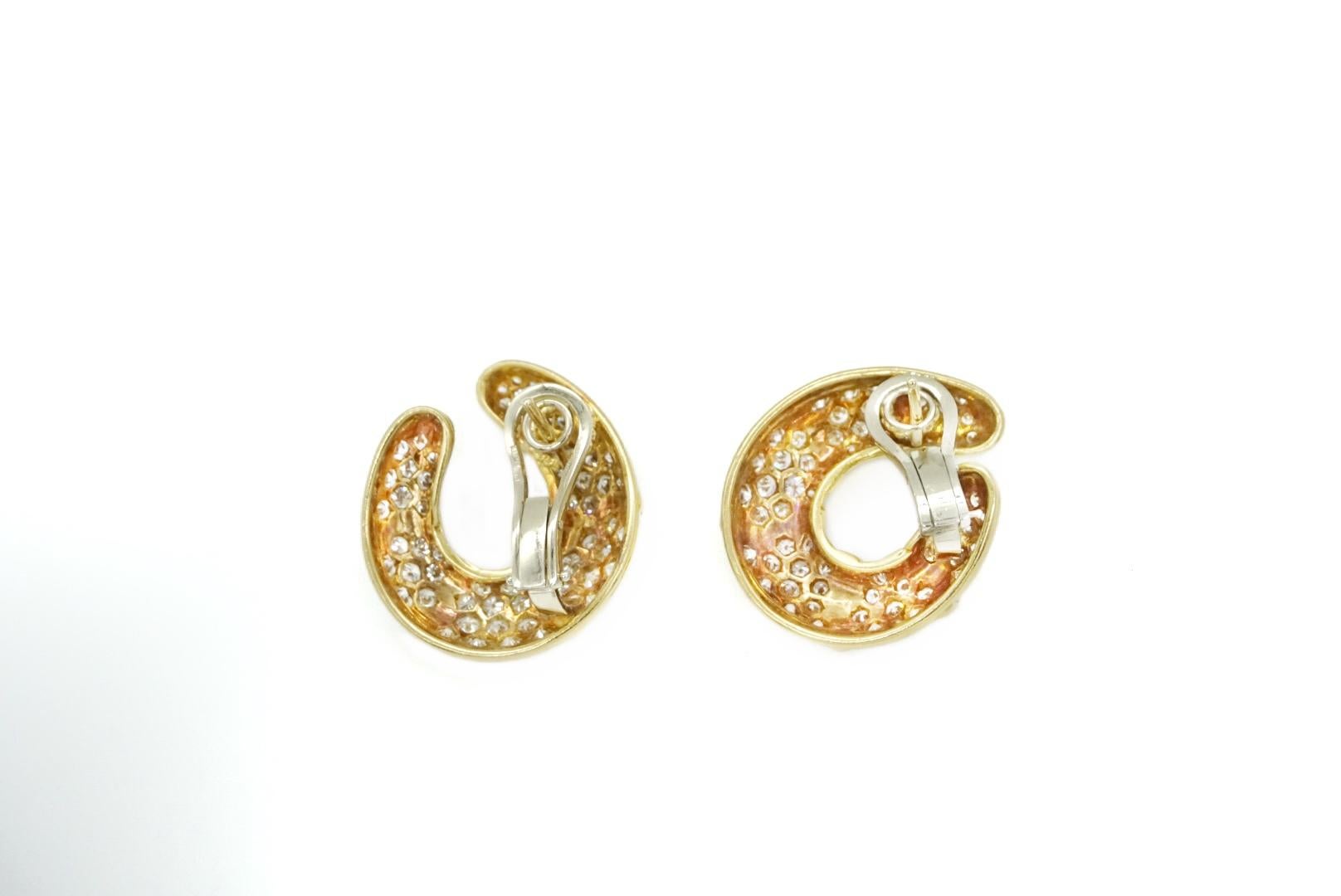 A fine pair of Diamond Earrings in 18k Yellow Gold with 122 Diamonds Weighing 10.00 cts. Made in the USA, circa 1970.
F-G Color VVS-VS Clarity 
Gold Weight: 29.70 gm