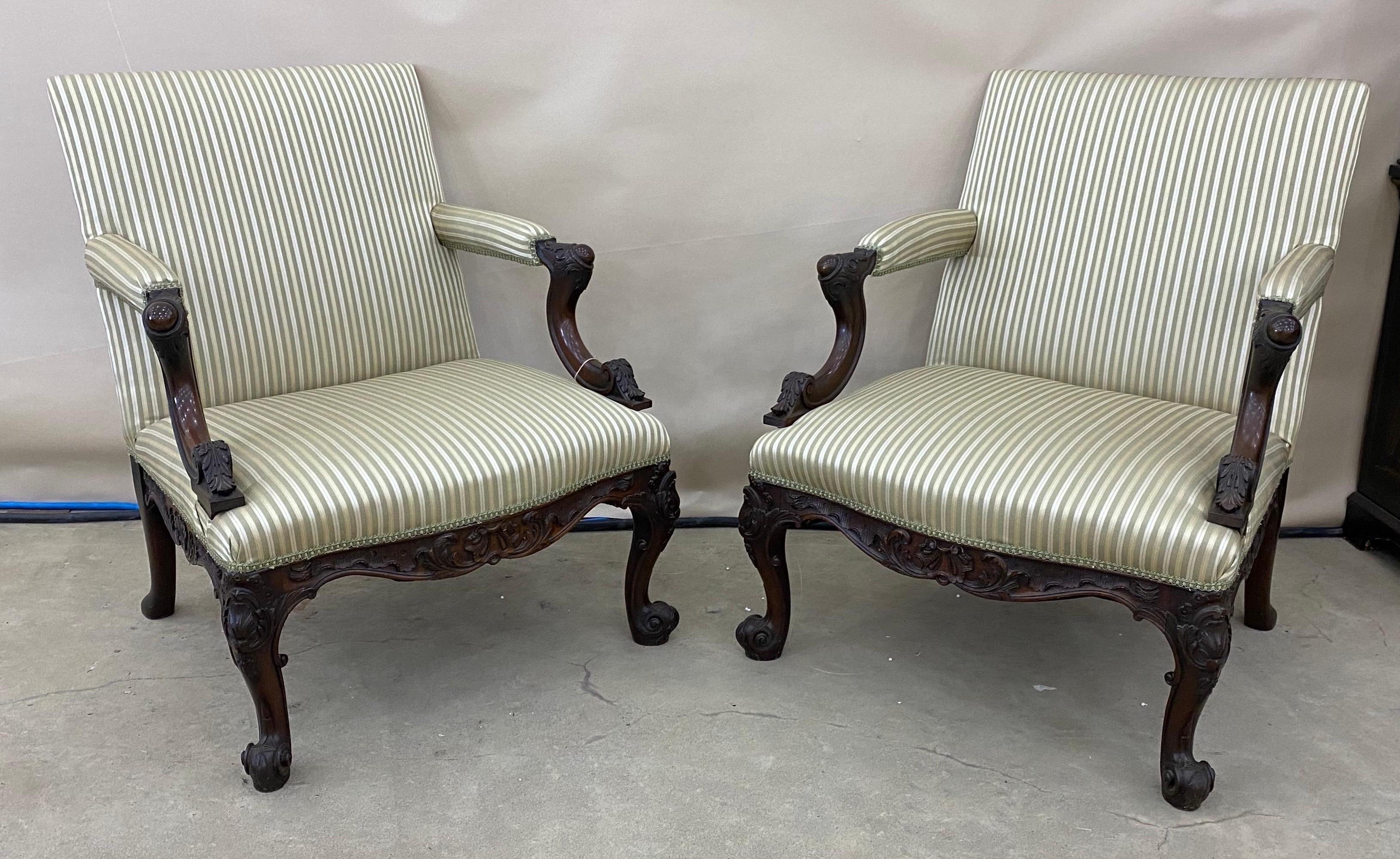 Fine pair of early 19th century Georgian mahogany Gainsborough chairs. Recently reupholstered.